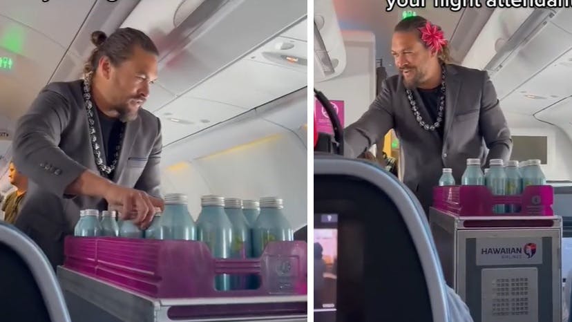 Her deler Jason Momoa vandflasker ud til de øvrige passagerer.