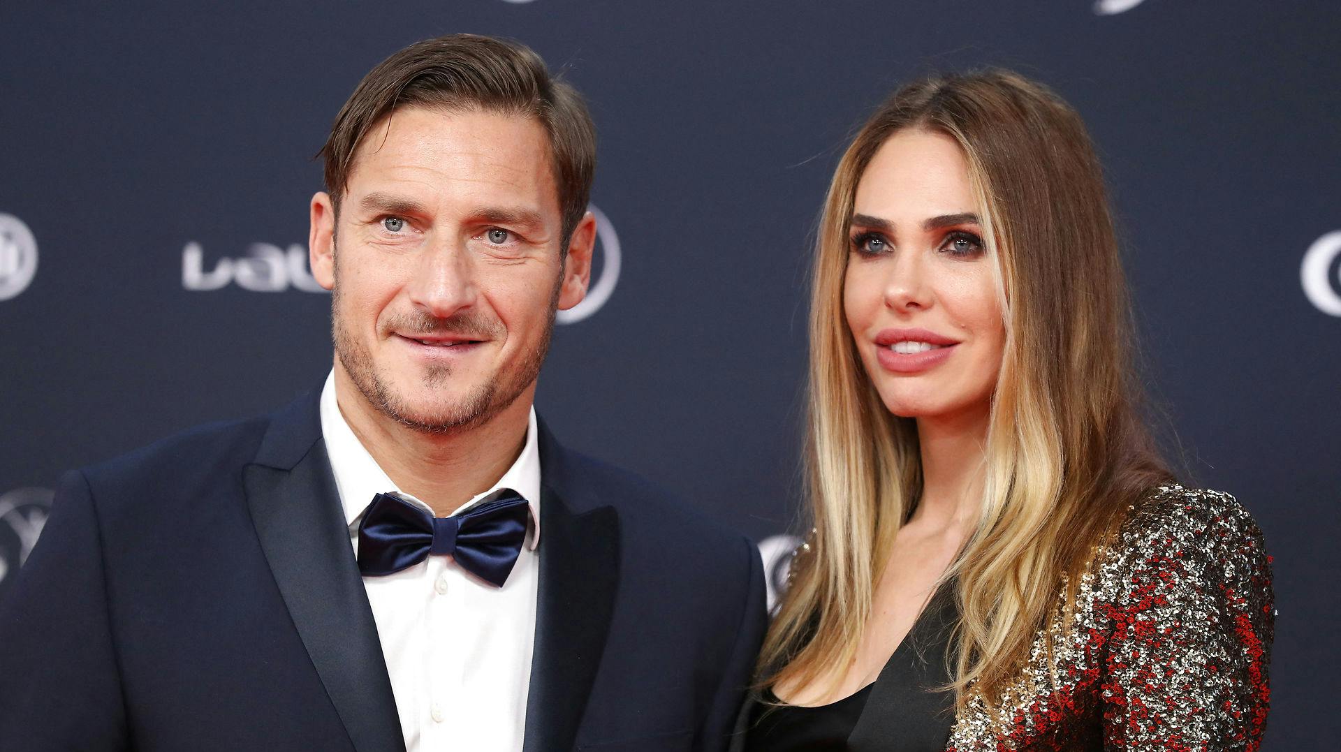 Francesco Totti aog hans kommende ekskone, Ilary Blasi.