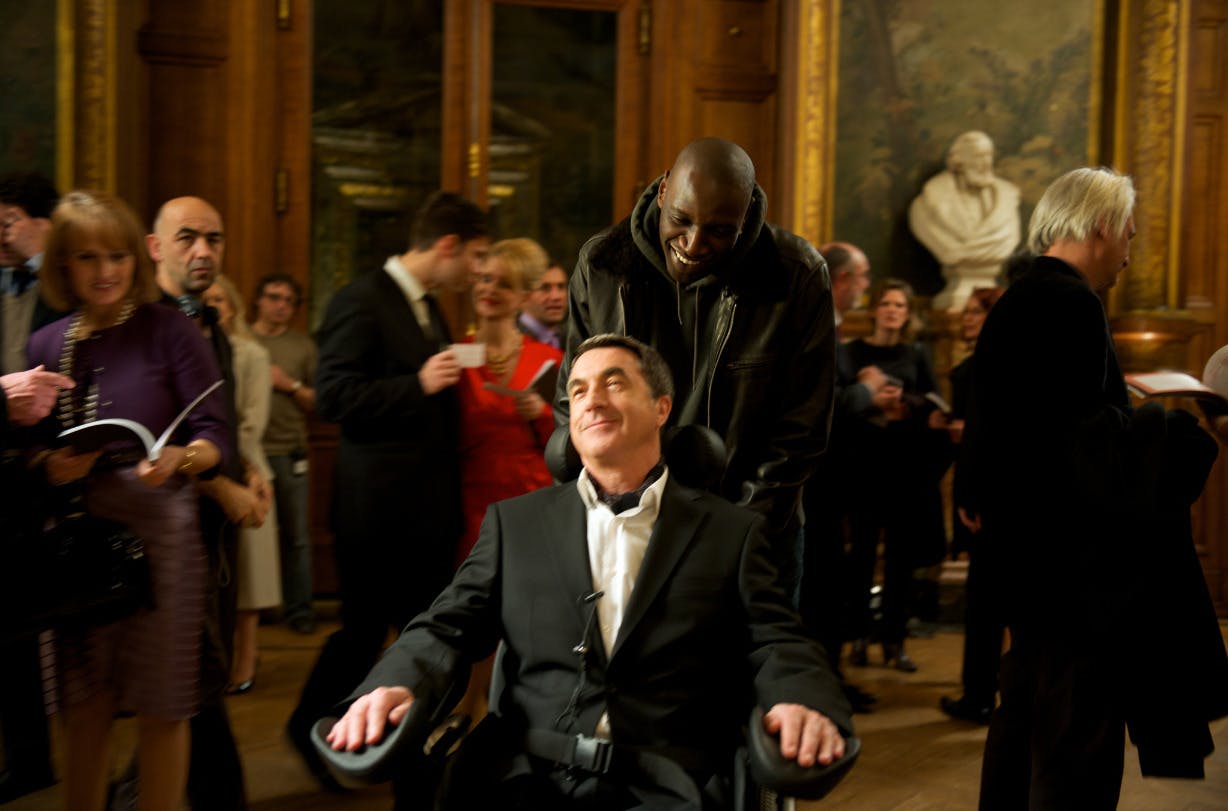 François Cluzet som Philippe og Omar Sy som Driss i det franske filmhit "De urørlige".
