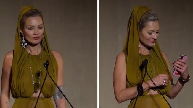 Kate Moss havde blandt andet travlt med at kigge på sin telefon under talen.