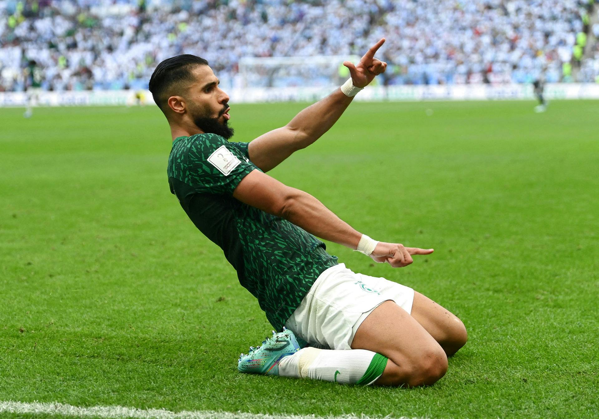 Saudi Arabiaens Saleh Al-Shehri jubler efter første scoring.&nbsp;
