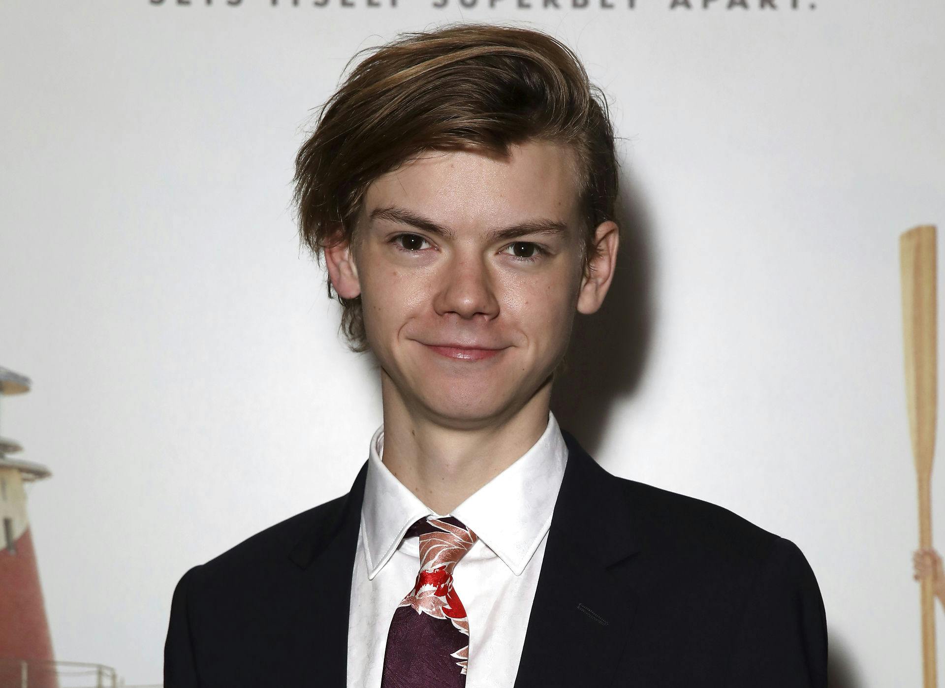 Thomas Brodie-Sangster fotograferet i februar 2018.