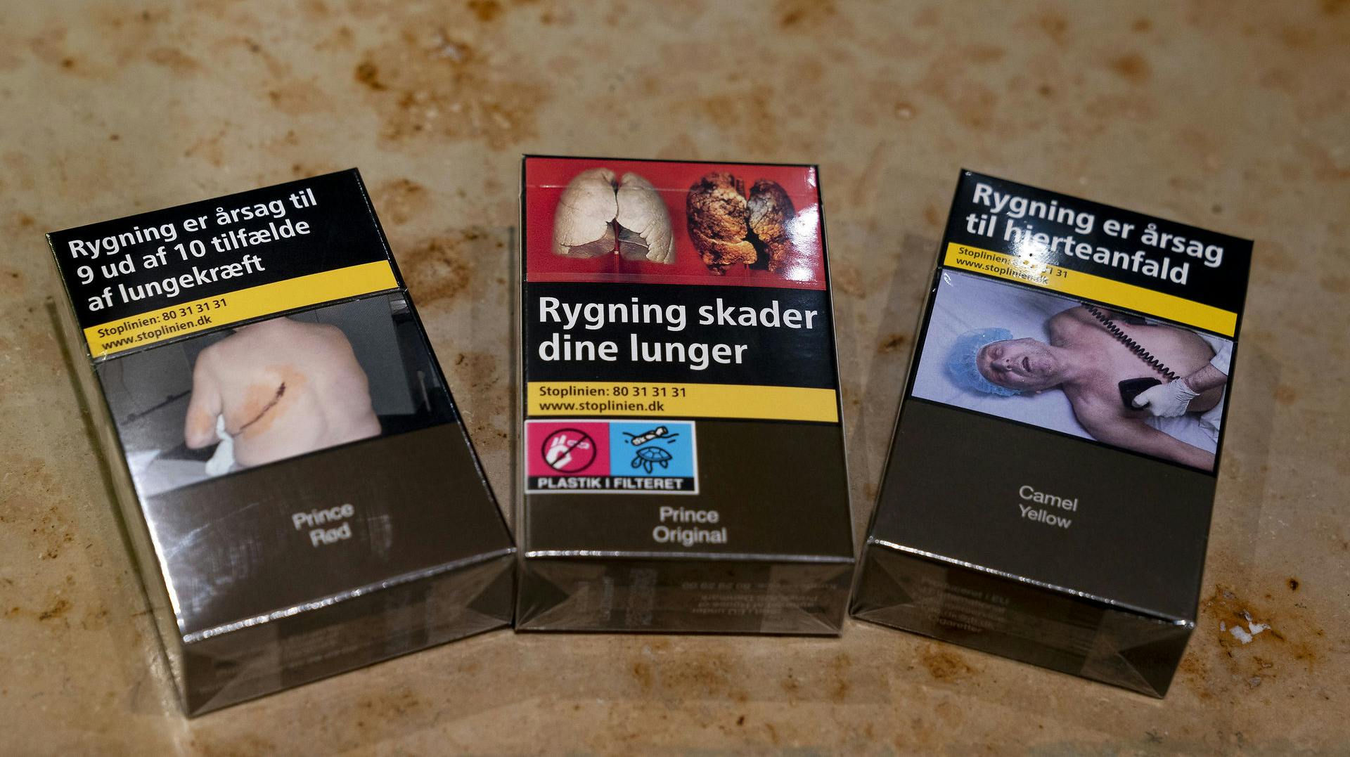 To mænd er blevet tiltalt for at have solgt godt og vel 14 millioner ulovlige cigaretter.