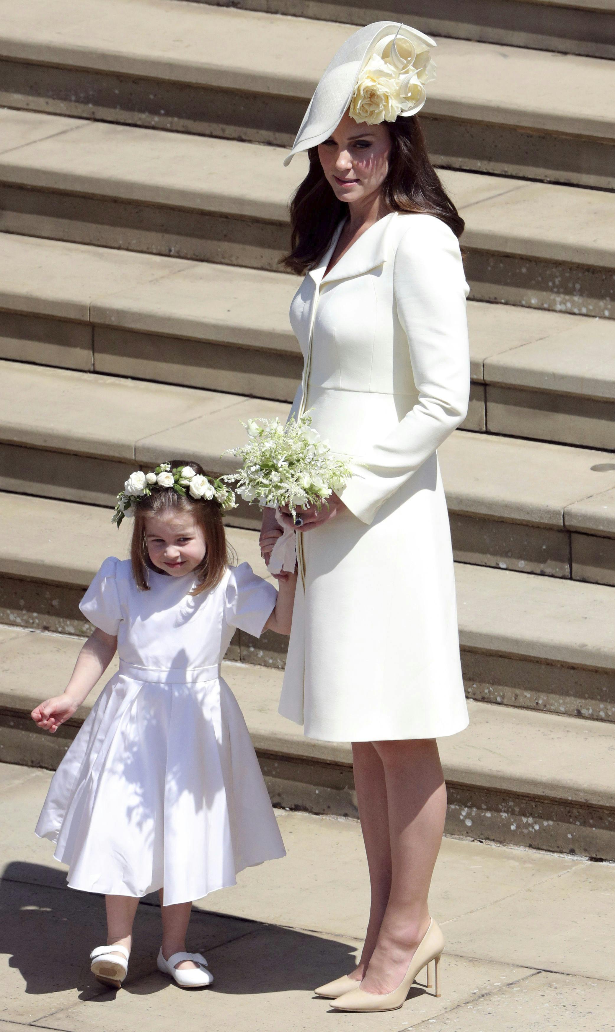 Prinsesse Charlotte i sin fine kjole til Meghan og Harrys bryllup i maj 2018.

