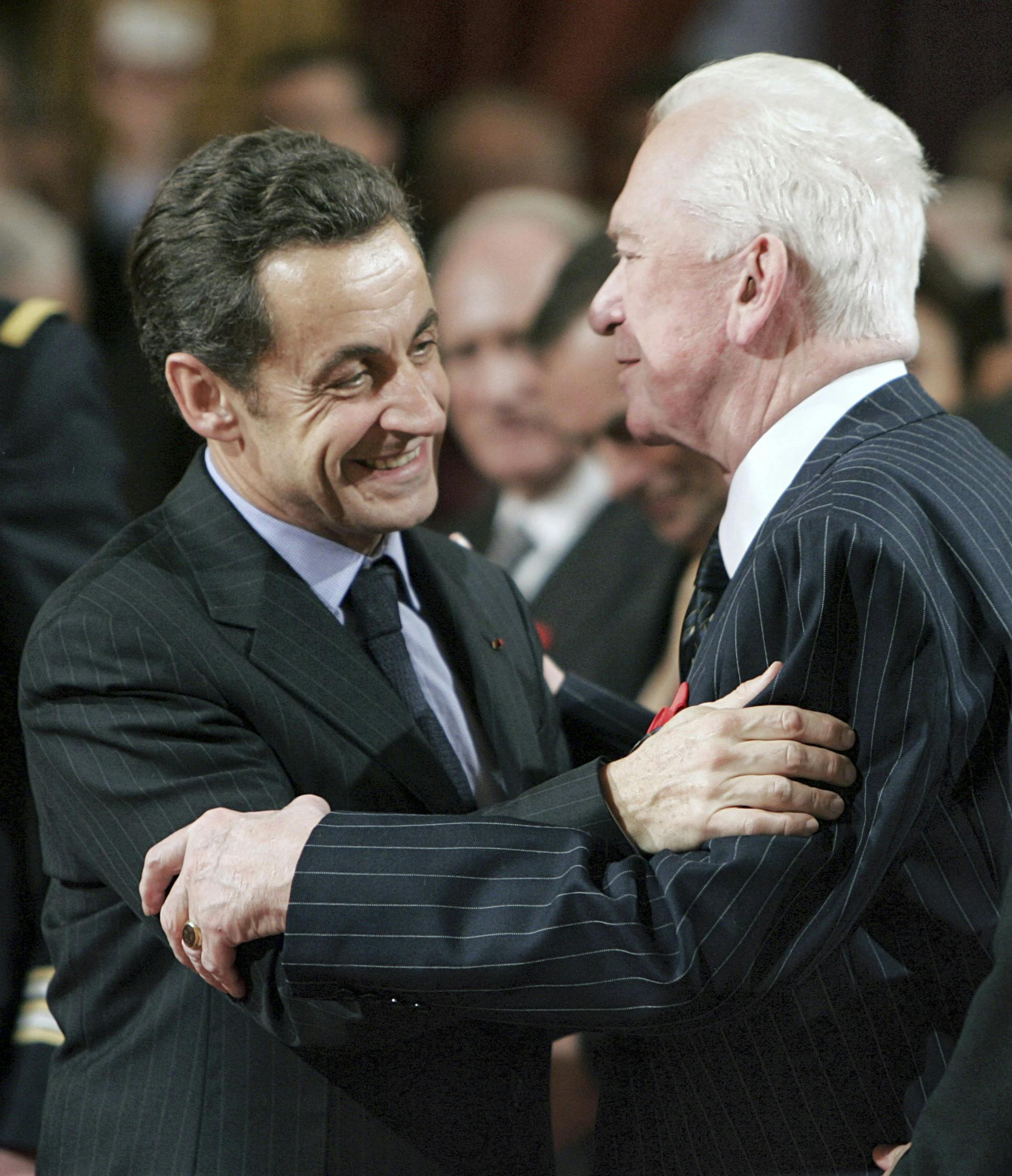 Nicolas Sarkozy og Jean-Paul Guerlain