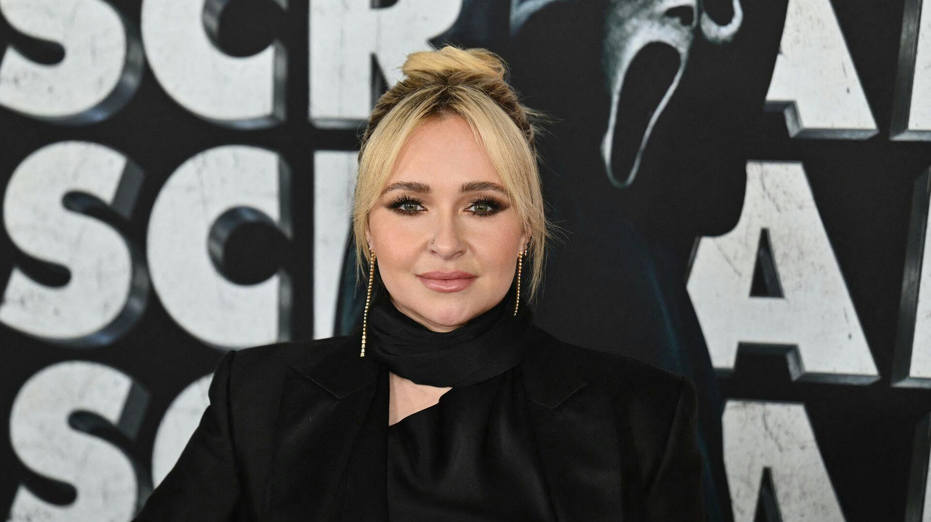 Hayden Panettiere har fundet sammen med sin voldelige ekskæreste igen.