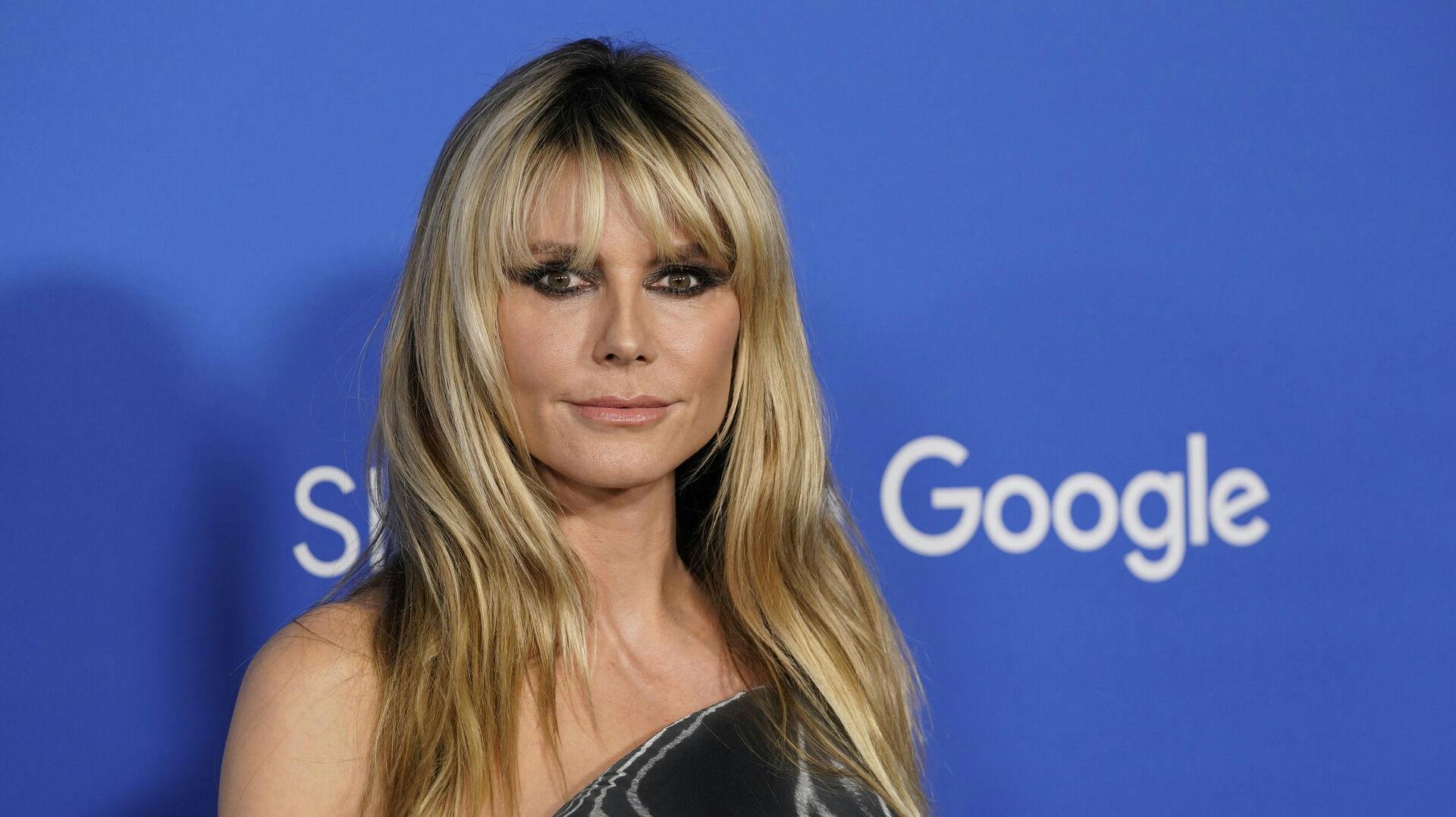 Heidi Klum smider endnu engang tøjet. nbsp;