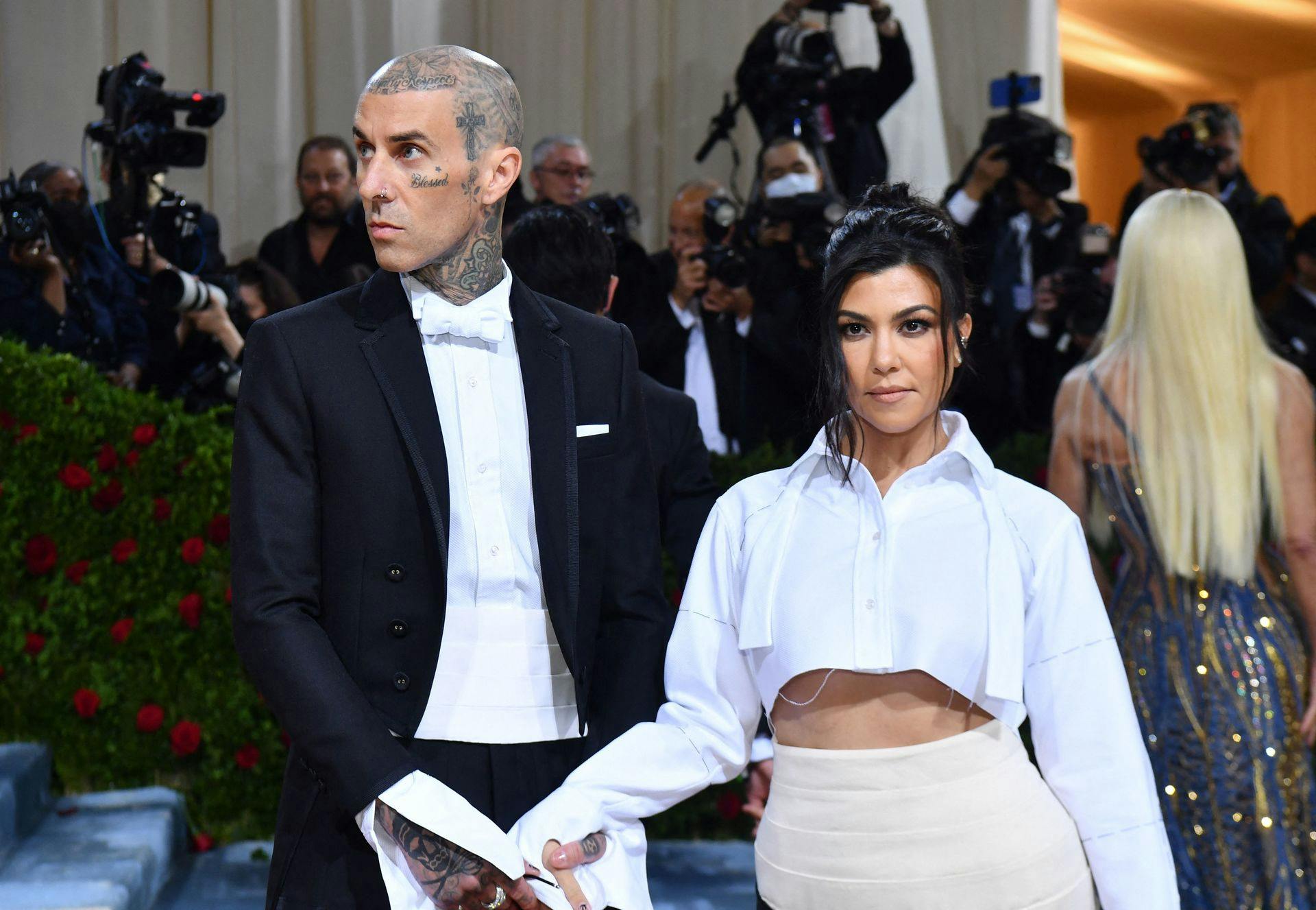 Travis Barker og Kourtney Kardashian kæmper for en baby.