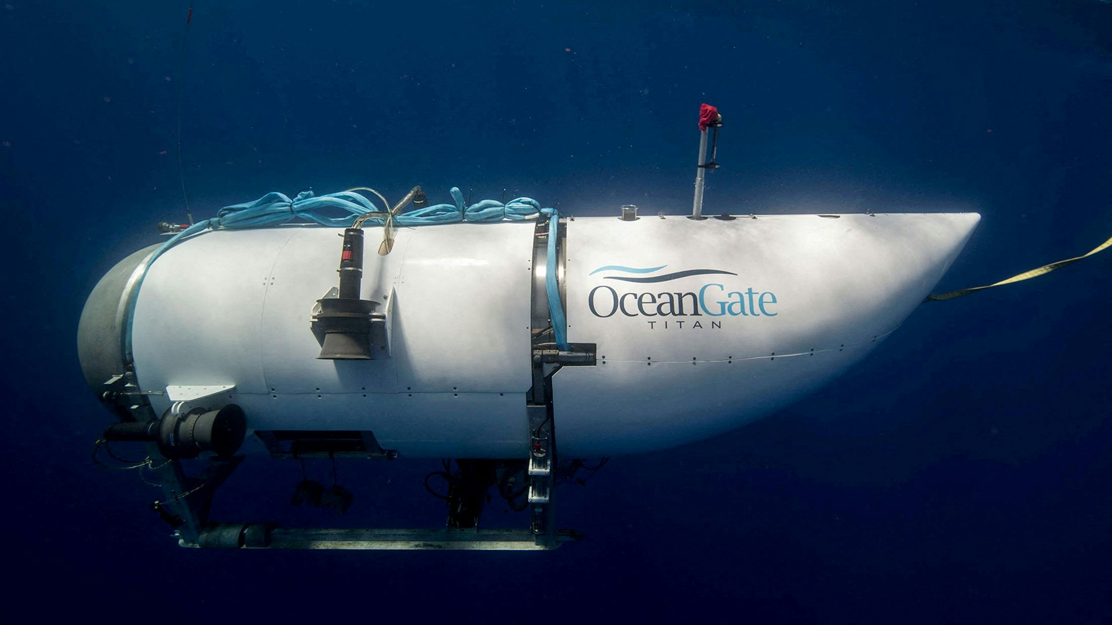 FILE PHOTO: The Titan submersible, operated by OceanGate Expeditions to explore the wreckage of the sunken SS Titanic off the coast of Newfoundland, dives in an undated photograph. OceanGate Expeditions/Handout via REUTERS NO RESALES.NO ARCHIVES. THIS IMAGE HAS BEEN SUPPLIED BY A THIRD PARTY./File Photo