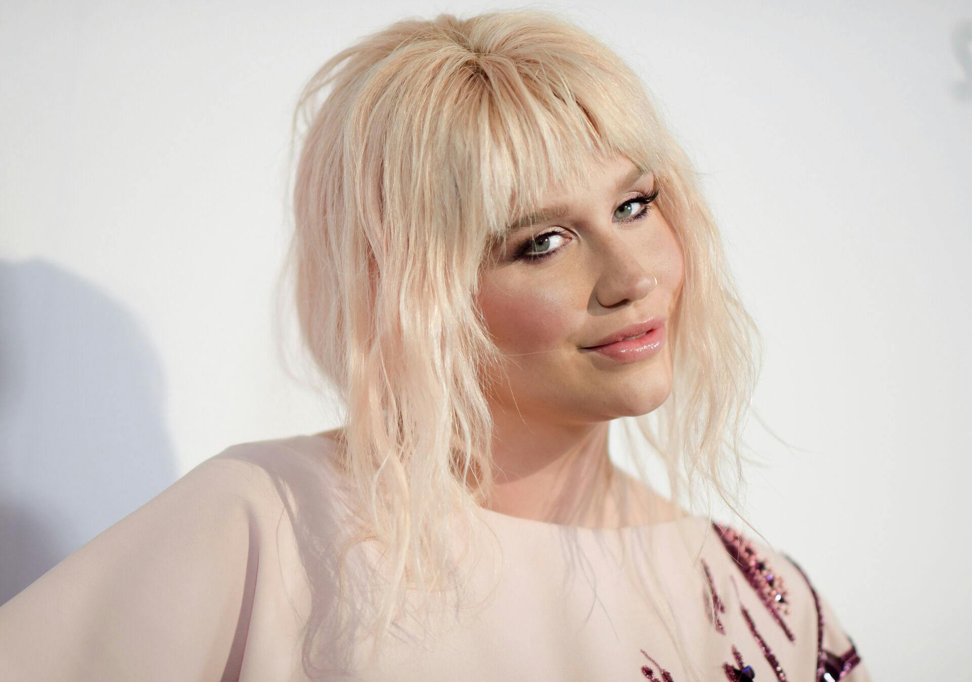 FILE - In this May 7, 2016 file photo, Kesha attends "To the Rescue: Saving Animal Lives" Gala and Fundraiser in Los Angeles. Dr. Luke and his record label say they are giving Kesha approval to perform at Sunday's Billboard Music Awards. His label, Kemosabe Records, said in a statement Thursday, May 19, 2016, that they are approving the performance after being reassured that Kesha was not going to use her time onstage to highlight their ongoing lawsuit. (Photo by Richard Shotwell/Invision/AP, File)