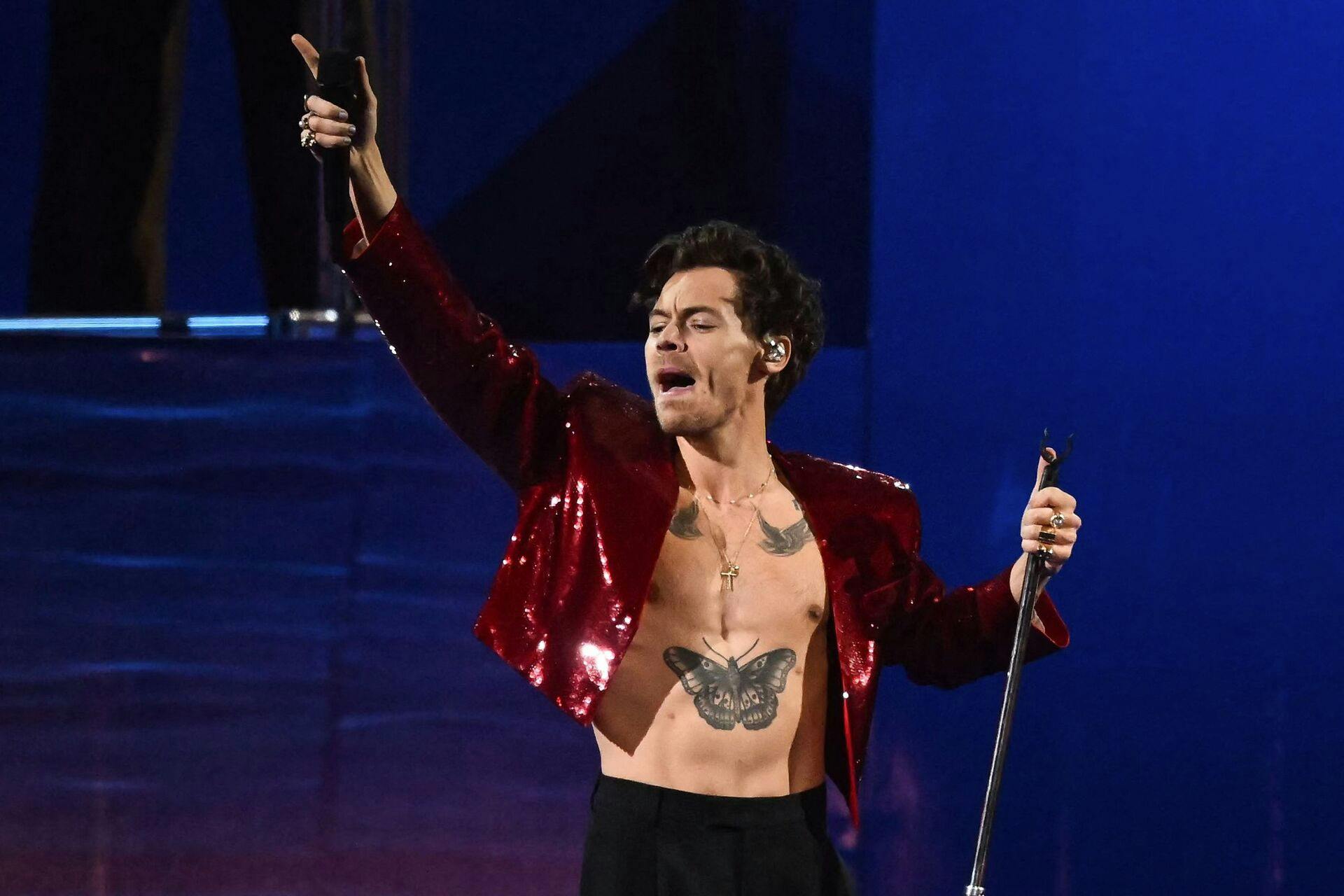 (FILES) British singer Harry Styles performs on stage during BRIT Awards 2023 ceremony and live show in London on February 11, 2023. Harry Styles is performing in Paris suburb of Saint-Denis on June 1, 2023. (Photo by Ben Stansall / AFP) / RESTRICTED TO EDITORIAL USE - NO POSTERS - NO MERCHANDISE- NO USE IN PUBLICATIONS DEVOTED TO ARTISTS