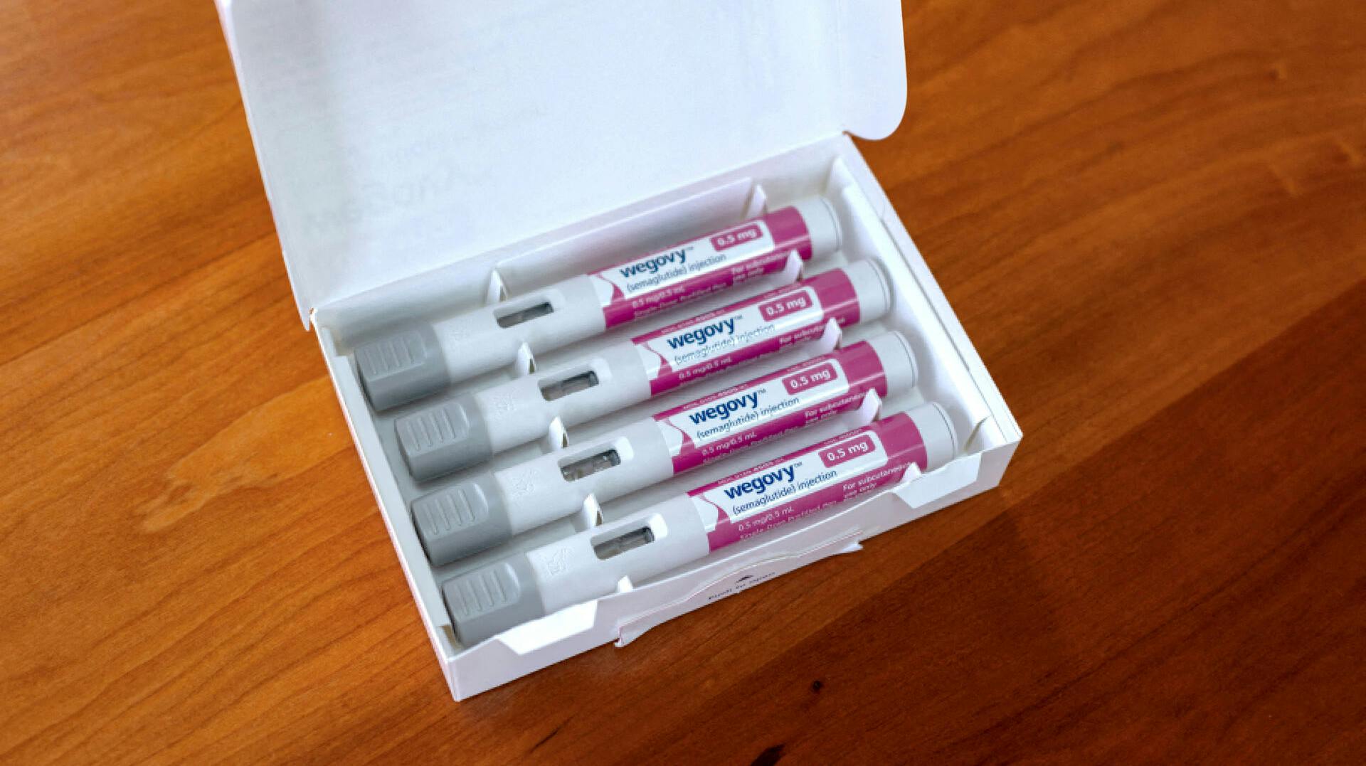 FILE PHOTO: A selection of injector pens for the Wegovy weight loss drug are shown in this photo illustration in Chicago, Illinois, U.S., March 31, 2023. REUTERS/Jim Vondruska/Illustration/File Photo