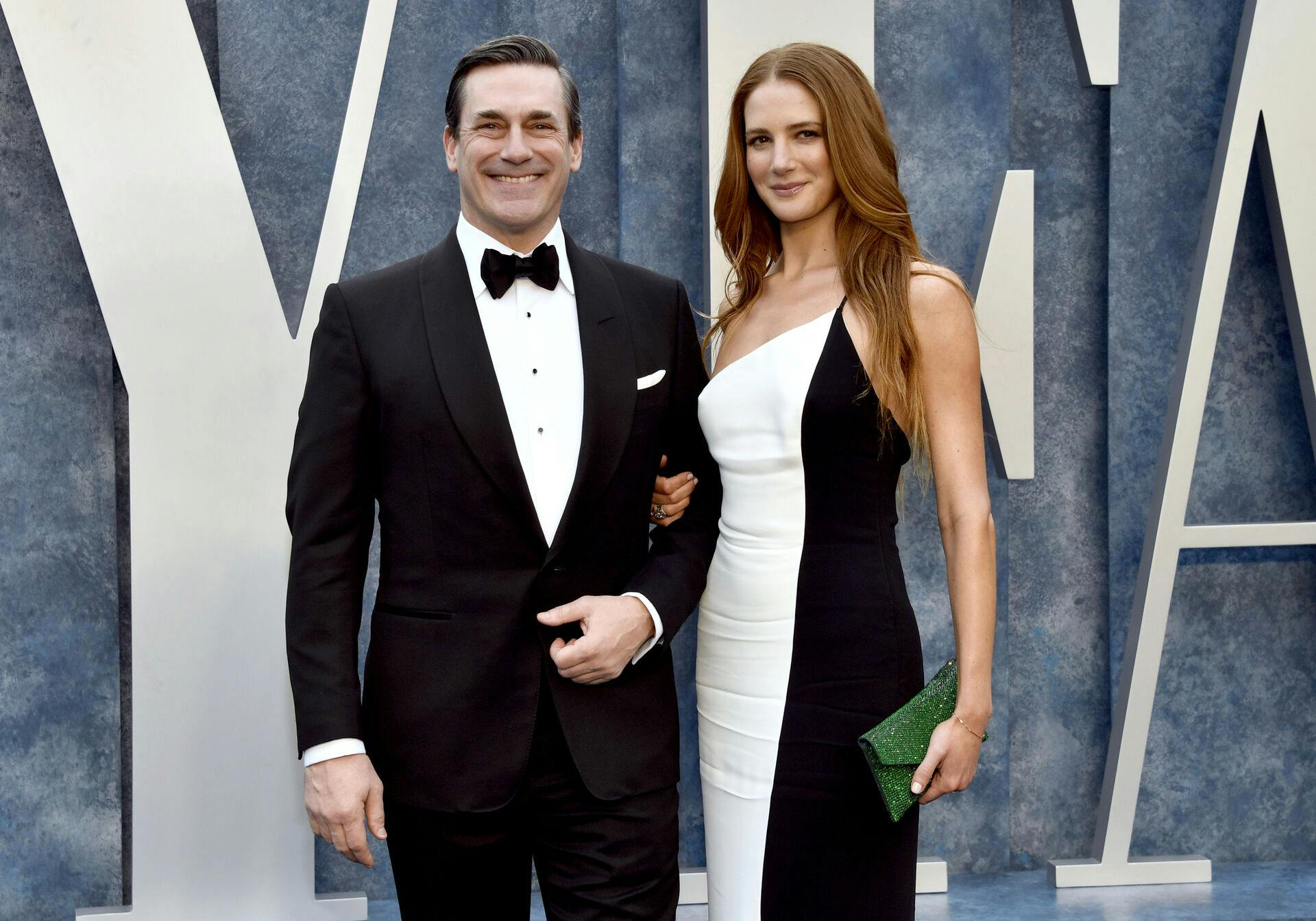 Jon Hamm, left, and Anna Osceola arrive at the Vanity Fair Oscar Party on Sunday, March 12, 2023, at the Wallis Annenberg Center for the Performing Arts in Beverly Hills, Calif. (Photo by Evan Agostini/Invision/AP)