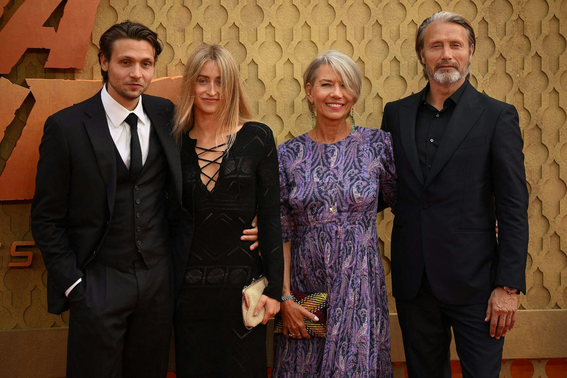 Danish actor Mads Mikkelsen (R) poses on the red carpet upon arrival for the UK Premiere of "Indiana Jones and the Dial of Destiny", at the Cineworld Leicester Square, central London, on June 26, 2023. (Photo by Daniel LEAL / AFP)