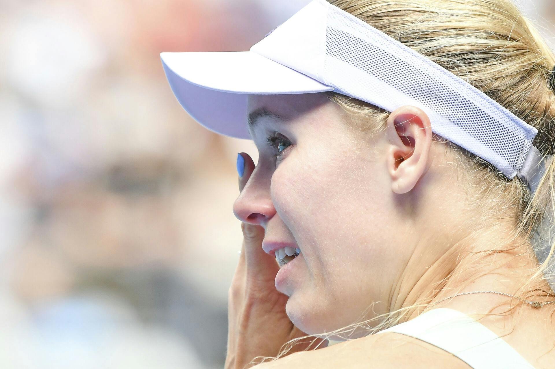 Wozniacki lukkede første omgang af sin professionelle tenniskarriere i tårer, efter hun tabte til Ons Jabeur til Australien Open i januar 2020. 