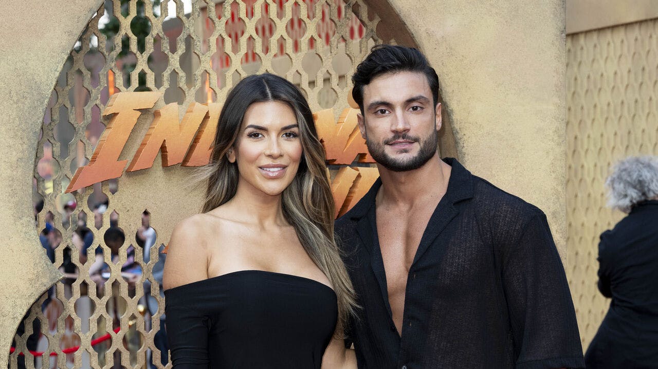 Ekin-Su Culculogiu, left, and Davide Sanclimenti pose for photographers upon arrival at the premiere of the film 'Indiana Jones and the Dial of Destiny' on Monday, June 26, 2023 in London. (Scott Garfitt/Invision/AP)