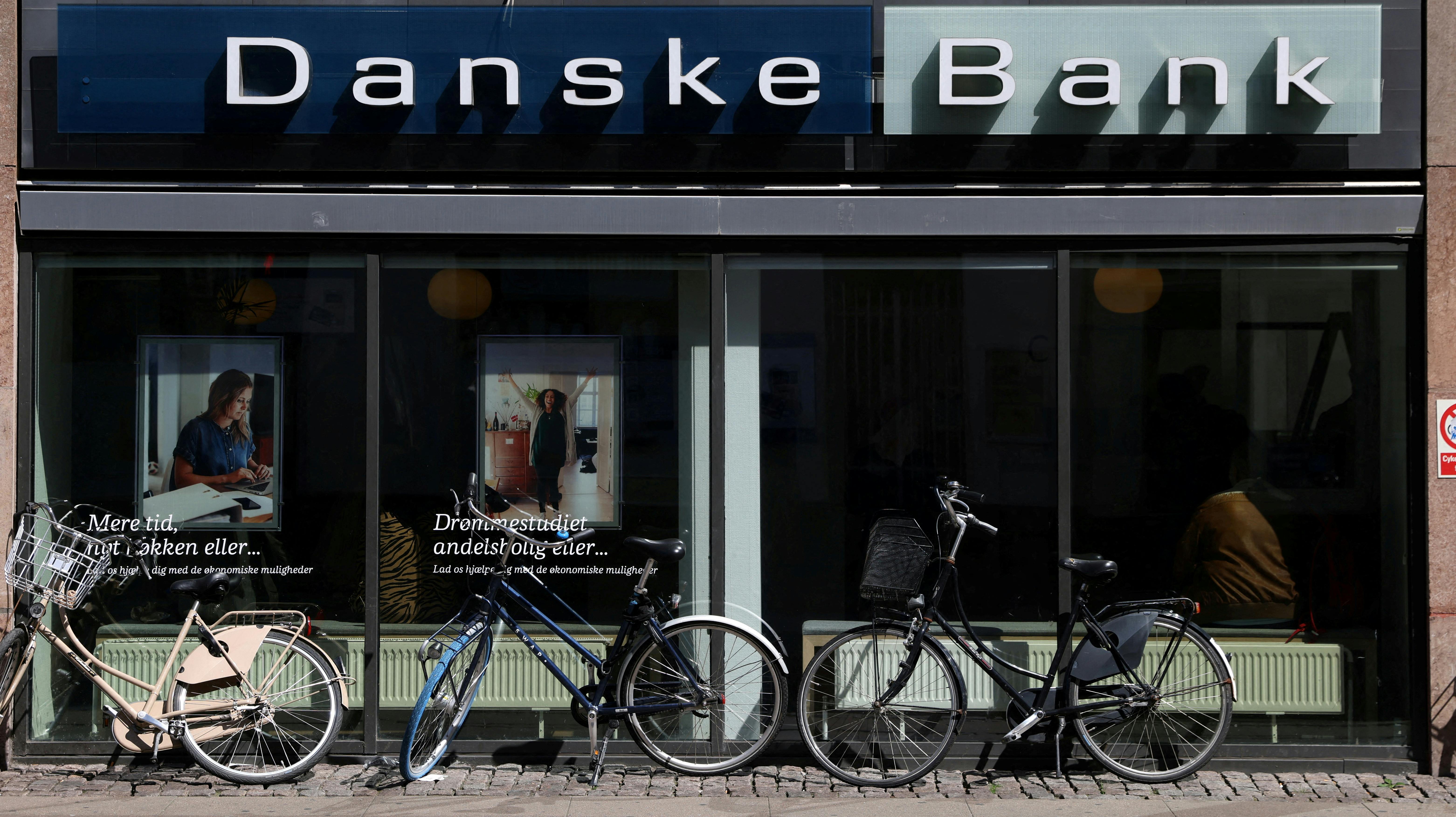 FILE PHOTO: Bicycles are parked outside of a Danske Bank branch in Copenhagen, Denmark, July 29, 2022. REUTERS/Andrew Kelly/File Photo