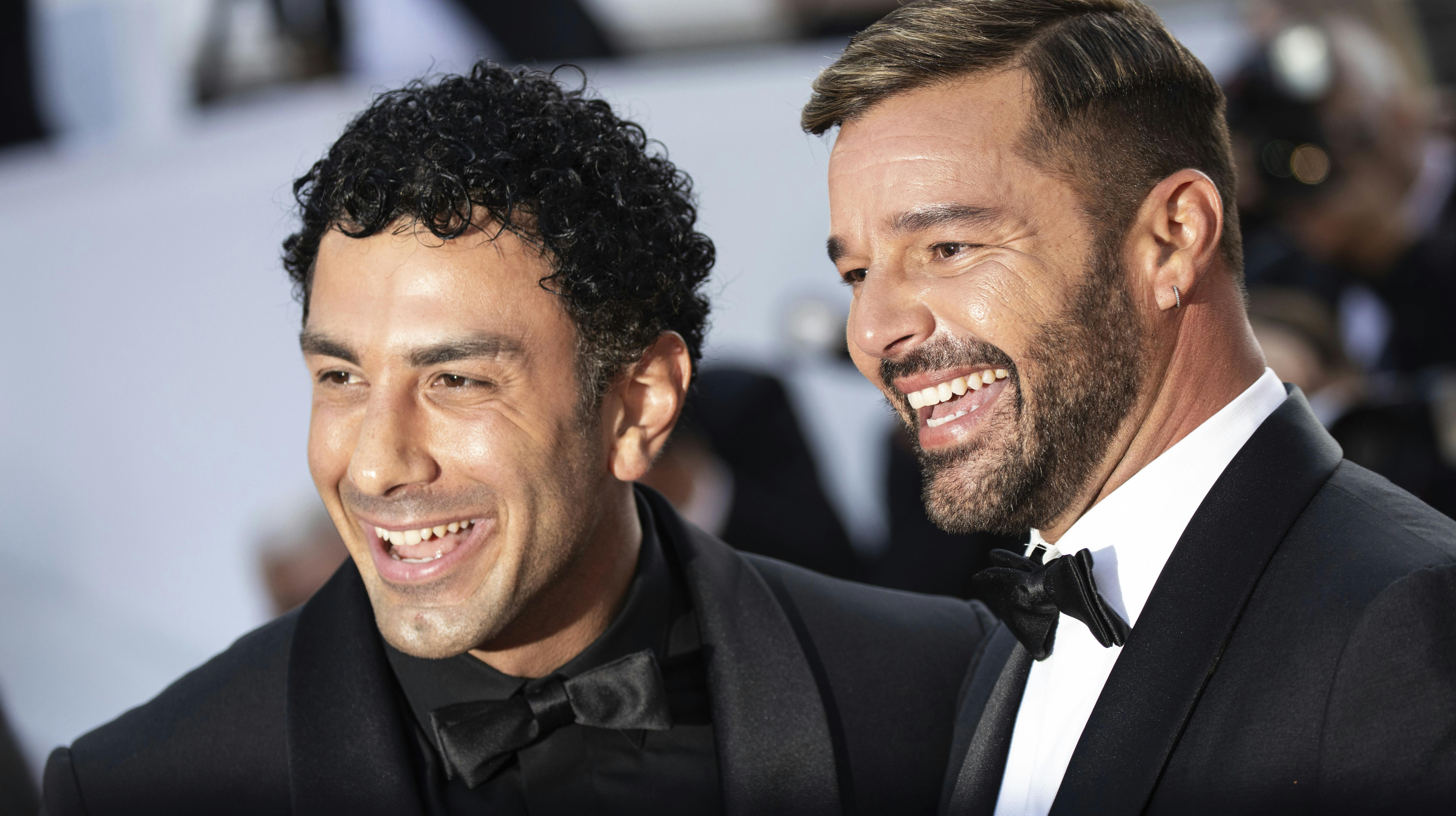 Jwan Yosef and Ricky Martin pose for photographers upon arrival at the premiere of the film 'Elvis' at the 75th international film festival, Cannes, southern France, Wednesday, May 25, 2022. (Photo by Vianney Le Caer/Invision/AP)