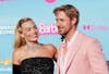 Australian actress Margot Robbie and Canadian-US actor Ryan Reynolds arrive for the world premiere of "Barbie" at the Shrine Auditorium in Los Angeles, on July 9, 2023. (Photo by Michael Tran / AFP)