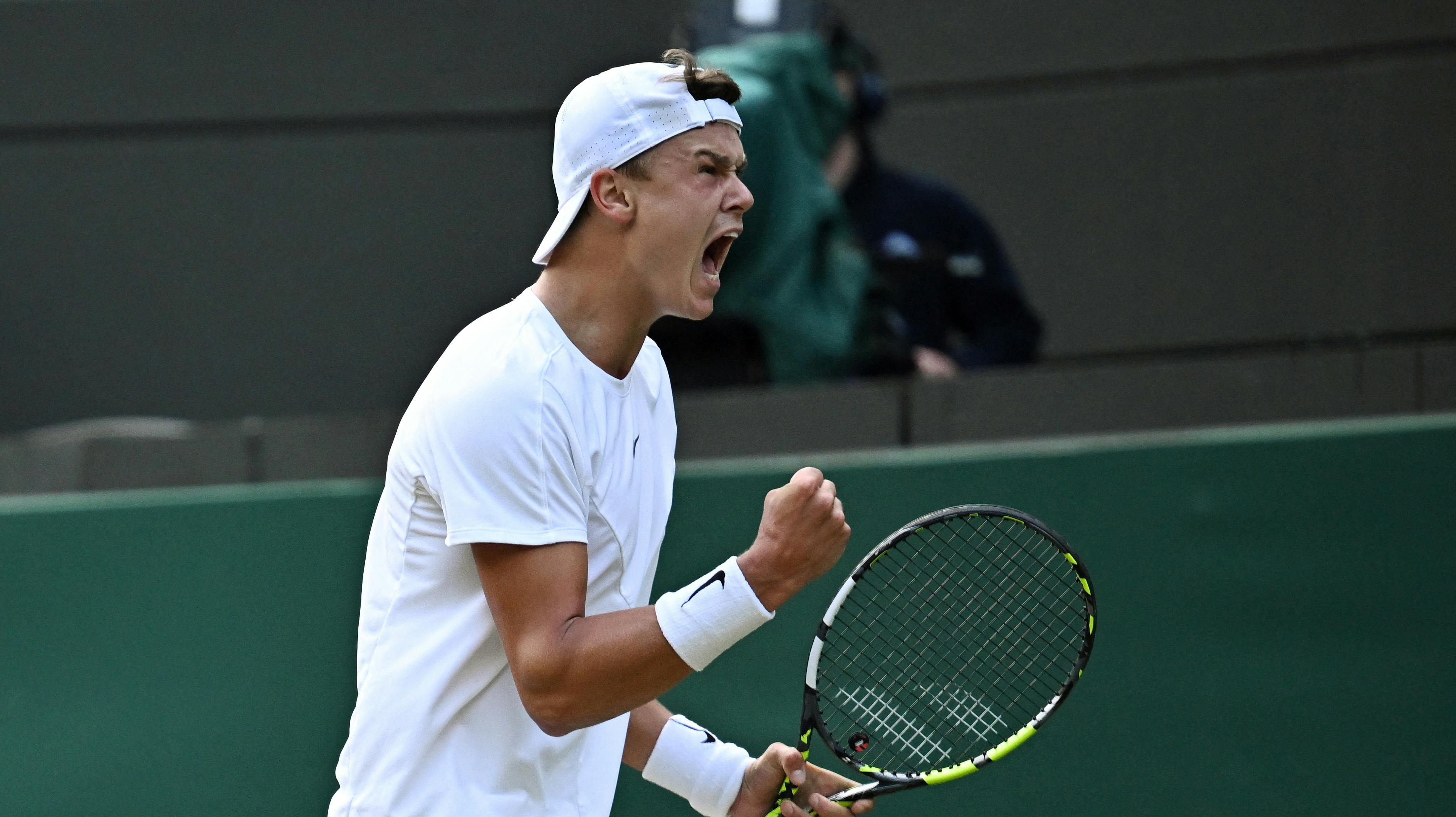 Tennis - Wimbledon - All England Lawn Tennis and Croquet Club, London, Britain - July 10, 2023 Denmark's Holger Rune during his fourth round match against Bulgaria's Grigor Dimitrov REUTERS/Dylan Martinez