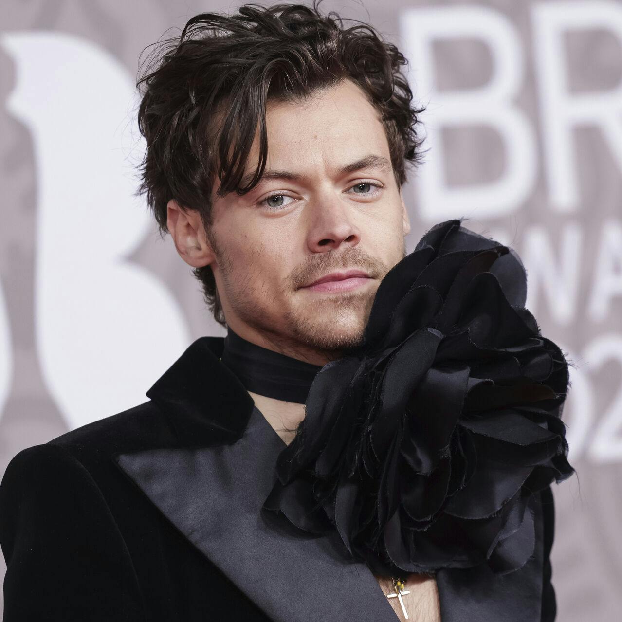 Harry Styles poses for photographers upon arrival at the Brit Awards 2023 in London, Saturday, Feb. 11, 2023. (Photo by Vianney Le Caer/Invision/AP)
