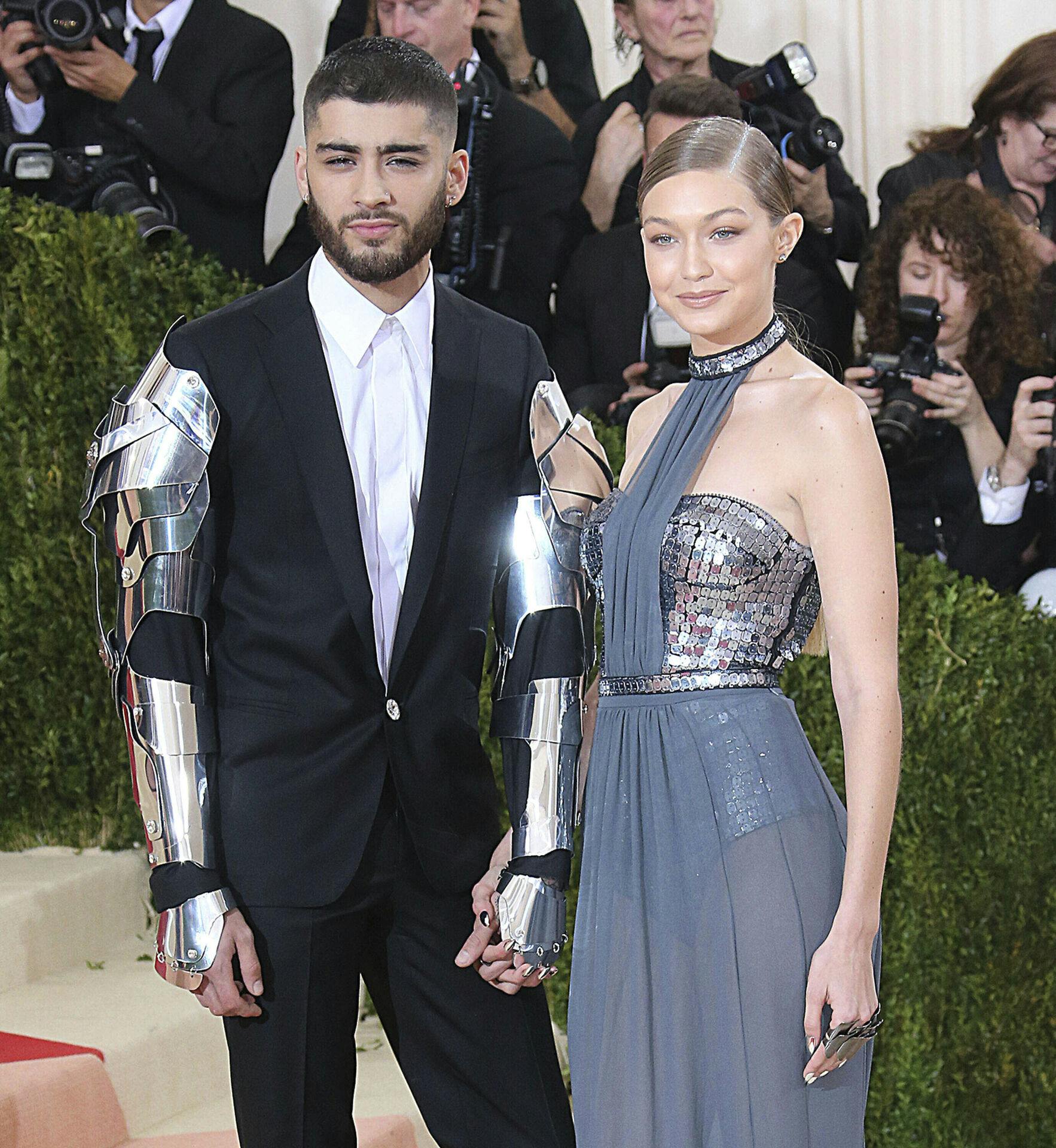 Photo by: XPX/STAR MAX/IPx 2020 4/28/20 Gigi Hadid and Zayn Malik expecting child together. STAR MAX File Photo: 5/2/16 Gigi Hadid and Zayn Malik at "Manus x Machina: Fashion In An Age of Technology" Costume Institute Gala. (Metropolitan Museum of Art, NYC)