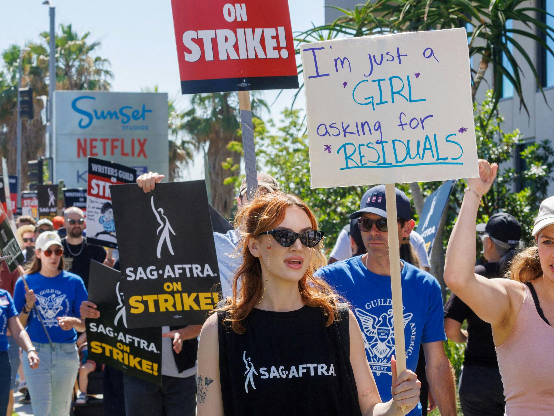 FILE PHOTO: SAG-AFTRA actors strike against the Hollywood studios as they join the Writers Guild of America (WGA) on the picket like outside of Netflix offices in Angeles, California, U.S., July 14, 2023. REUTERS/Mike Blake/File Photo