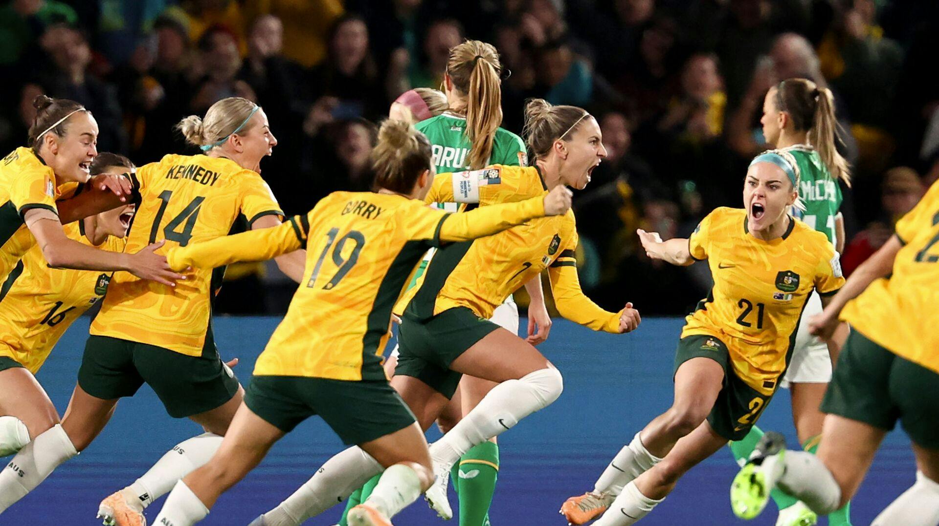 Australien fejrer målet mod Irland.