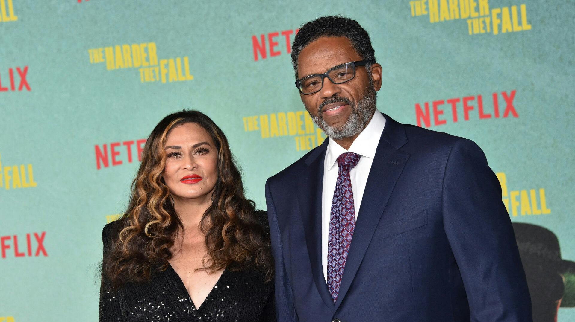 US businesswoman and fashion designer Tina Knowles (L) and husband actor Richard Lee Lawson arrive for the Los Angeles Special Screening of Netflix's "The Harder They Fall" at the Shrine Auditorium in Los Angeles, October 13, 2021. Chris DELMAS / AFP