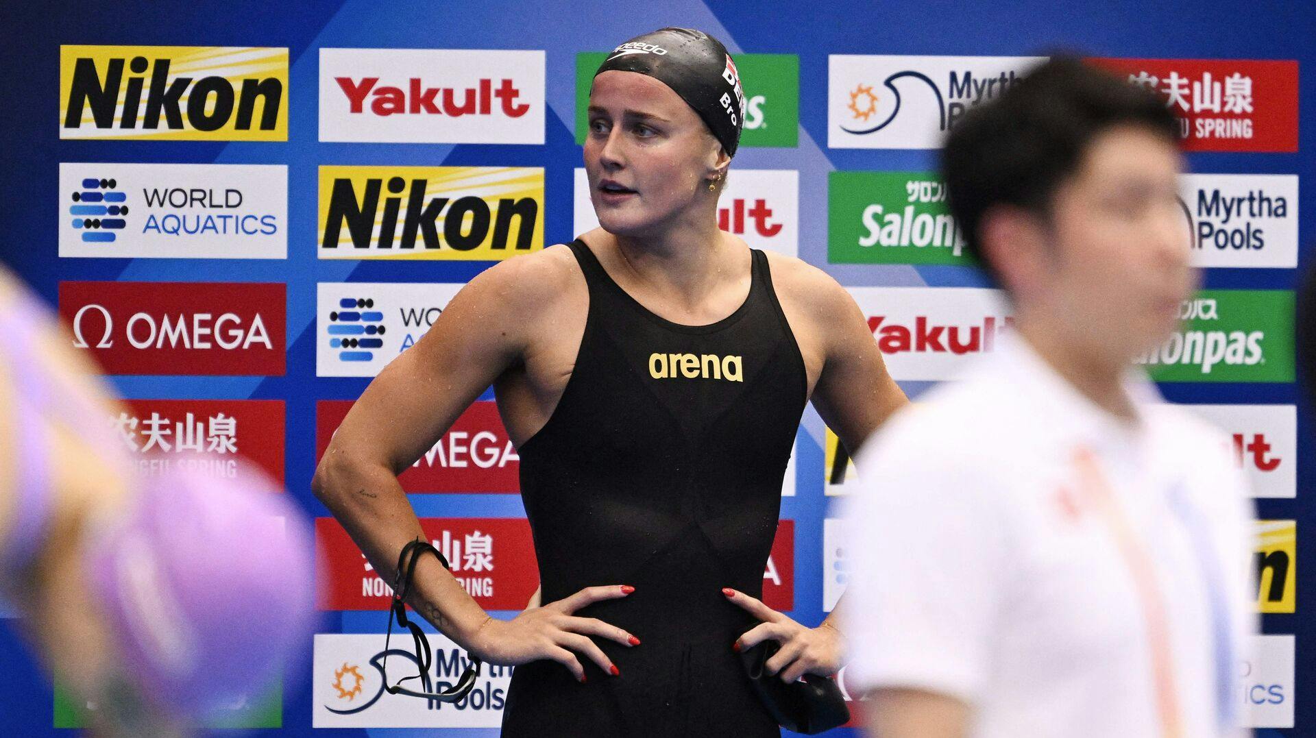 Denmark's Signe Bro reacts after competing in a heat of the women's 200m freestyle swimming event during the World Aquatics Championships in Fukuoka on July 25, 2023. (Photo by Philip FONG / AFP)