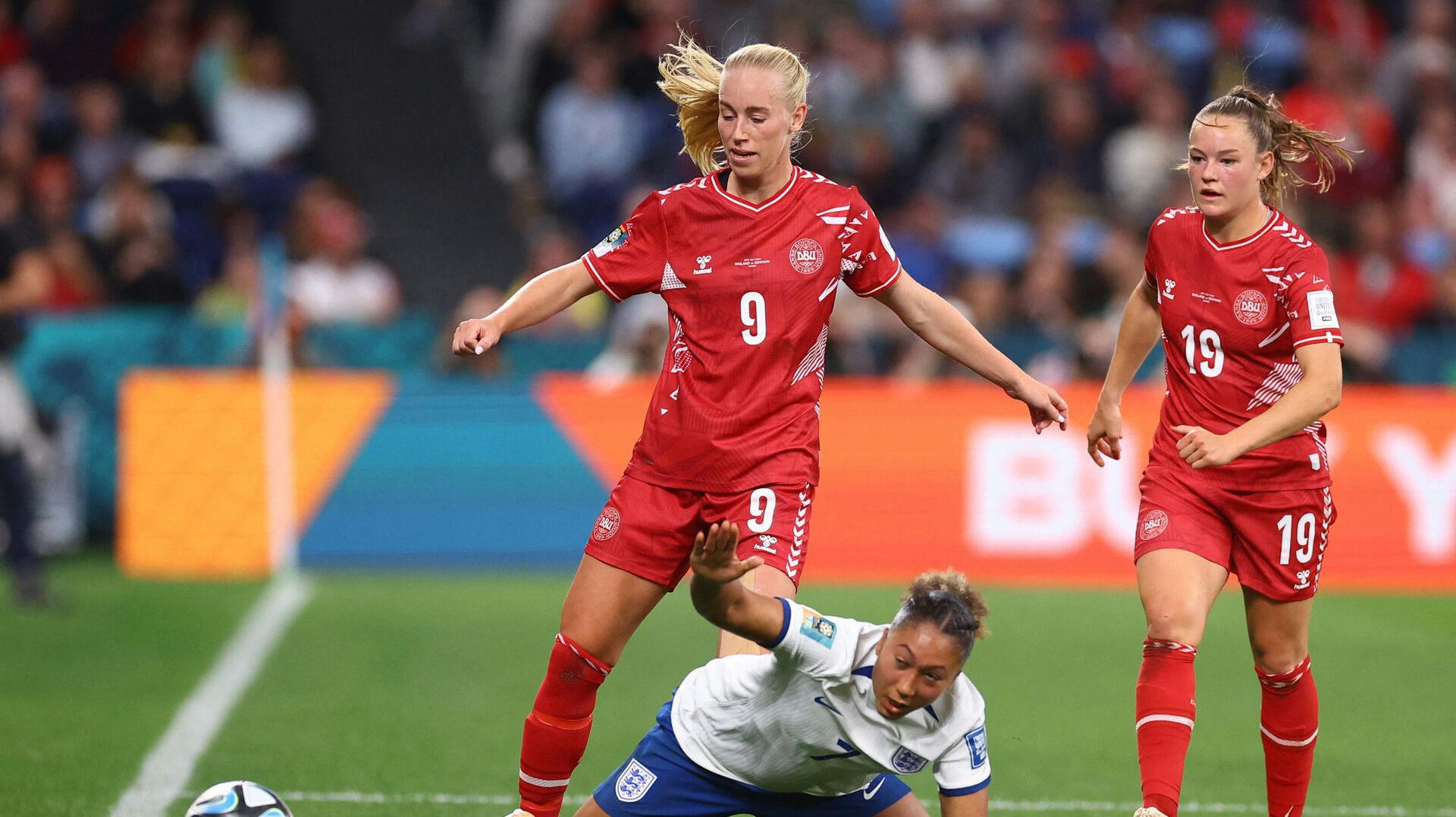 Soccer Football – FIFA Women's World Cup Australia and New Zealand 2023 – Group D – England v Denmark – Sydney Football Stadium, Sydney, Australia – July 28, 2023 Denmark's Amalie Vangsgaard in action with England's Lauren James REUTERS/Carl Recine