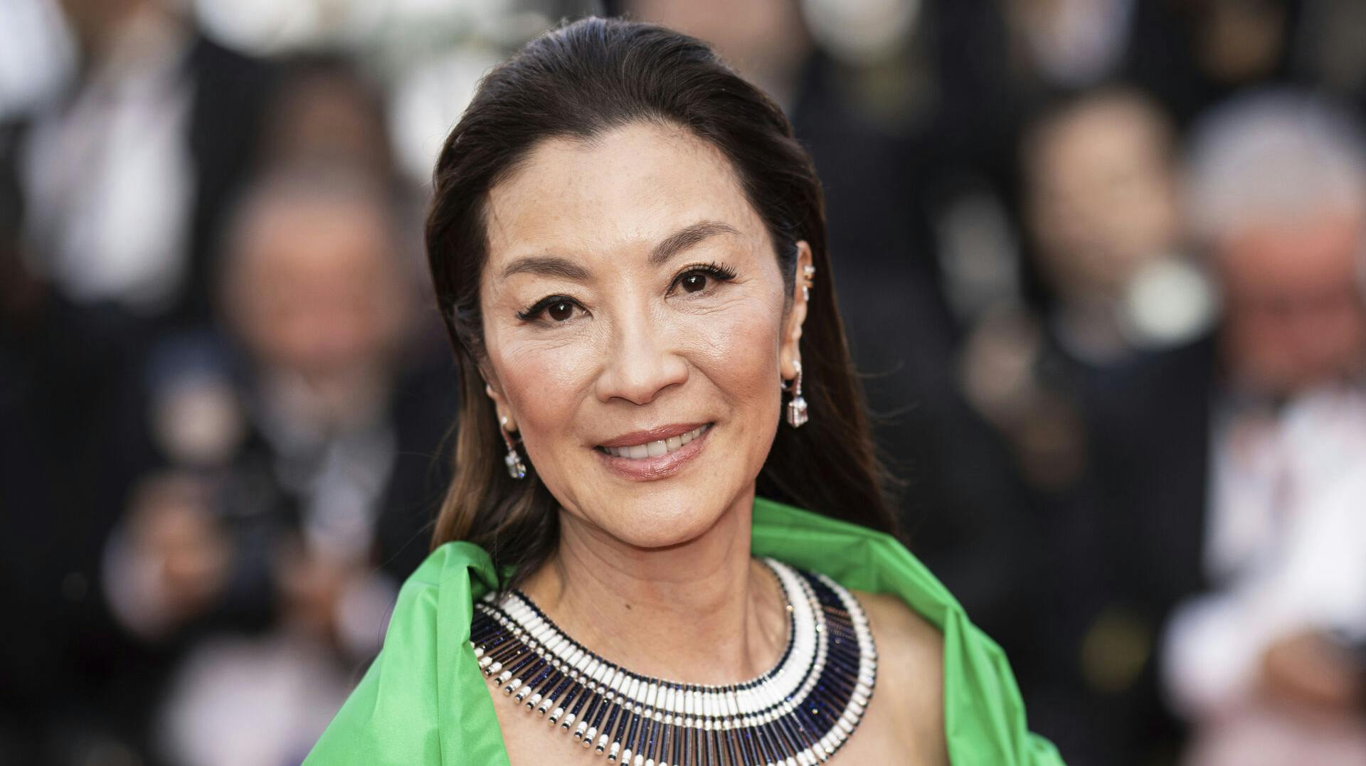 Michelle Yeoh poses for photographers upon arrival at the premiere of the film 'Firebrand' at the 76th international film festival, Cannes, southern France, Sunday, May 21, 2023. (Photo by Vianney Le Caer/Invision/AP)