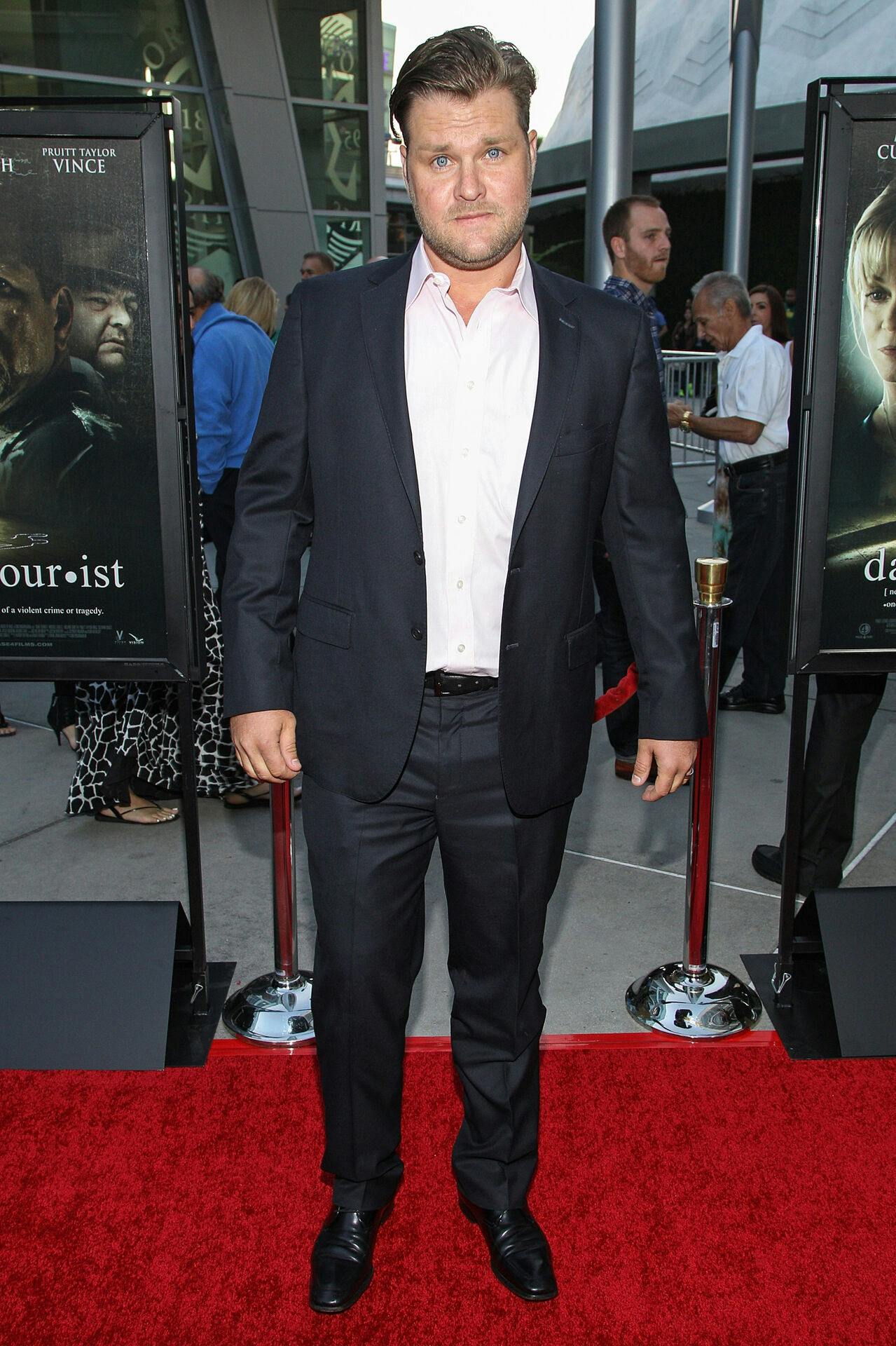 Actress Zachery Ty Bryan arrives at the premiere of "Dark Tourist" at the ArcLight Cinemas on Thursday, August 14, 2013 in Los Angeles. (Photo by Paul A. Hebert/Invision/AP)