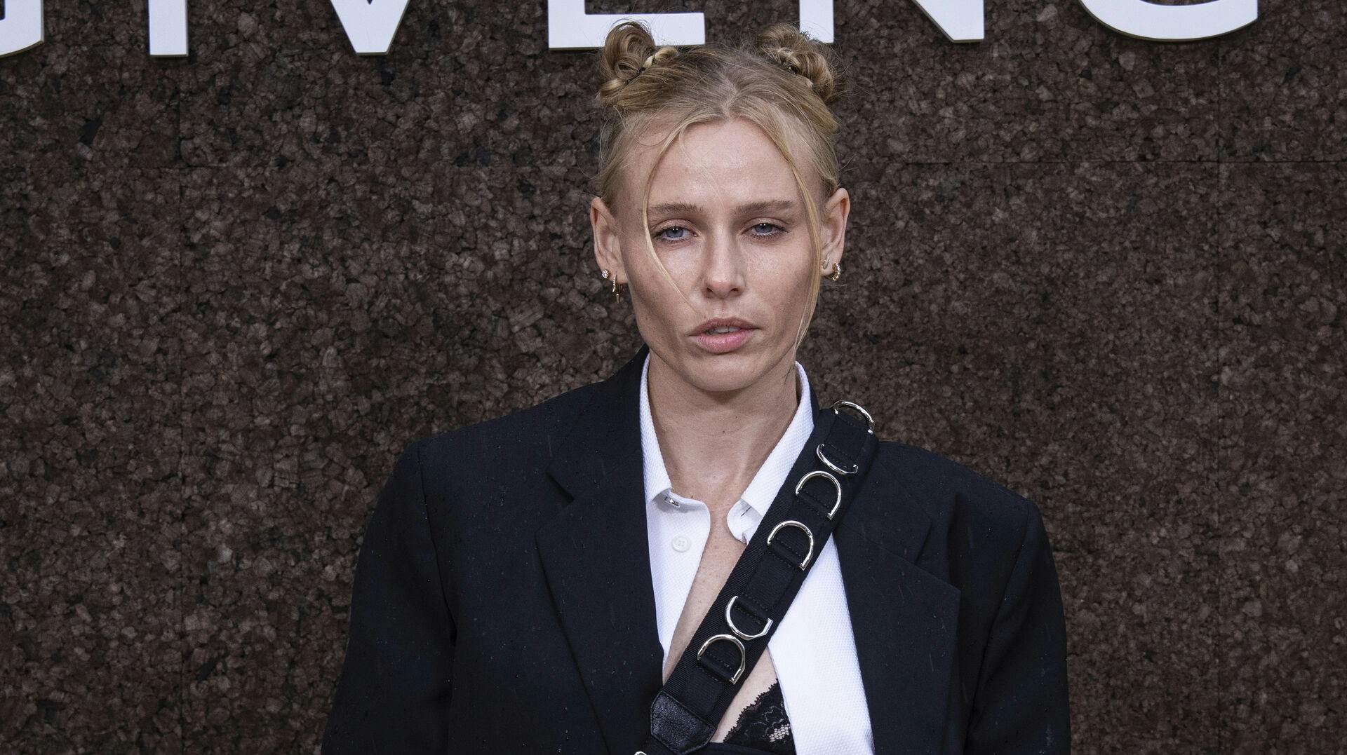Lauren Wasser poses for photographers upon arrival for the Givenchy ready-to-wear Spring/Summer 2023 fashion collection presented Sunday, Oct. 2, 2022 in Paris. (Photo by Vianney Le Caer/Invision/AP)