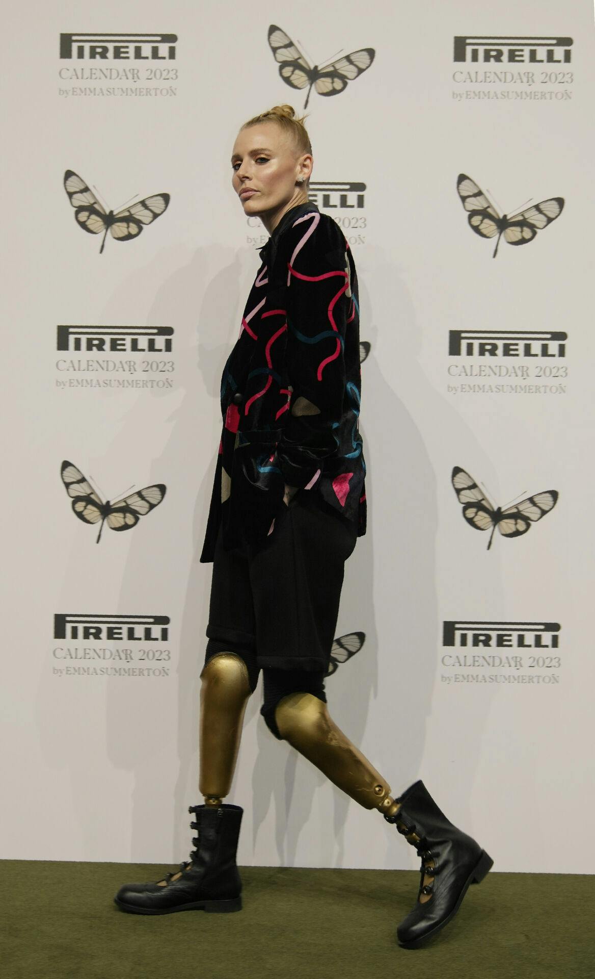 Model Lauren Wasser poses as she arrives to attend the 2023 Pirelli calendar gala at the hangar Bicocca in Milan, Italy, Wednesday, Nov. 16, 2022. The 2023 calendar titled "Love Letters to the Muse" was shot by Australia photographer Emma Summerton features models representing their personal passions. (AP Photo/Luca Bruno)