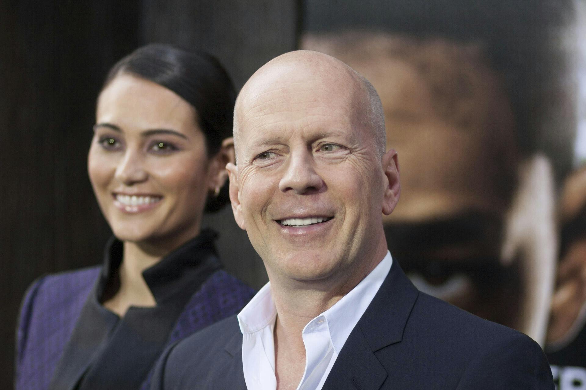 Photo by: NDZ/STAR MAX/IPx 2023 5/29/13 Emma Heming and Bruce Willis attend the "After Earth" premiere at Ziegfeld Theater on May 29, 2013 in New York City.