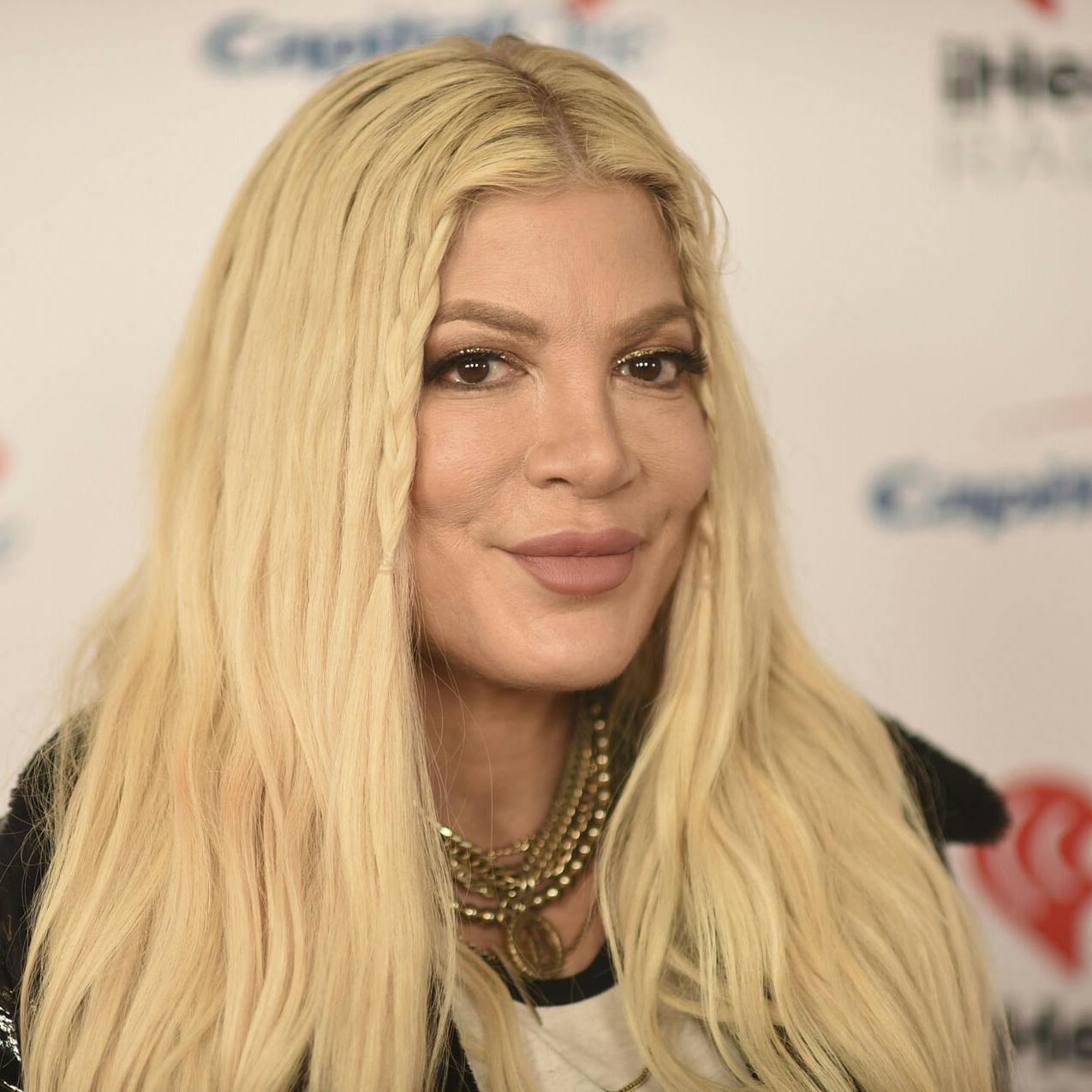 Tori Spelling arrives at iHeartRadio's ALTer EGO on Saturday, Jan. 14, 2023, at the Kia Forum in Inglewood, Calif. (Photo by Richard Shotwell/Invision/AP)