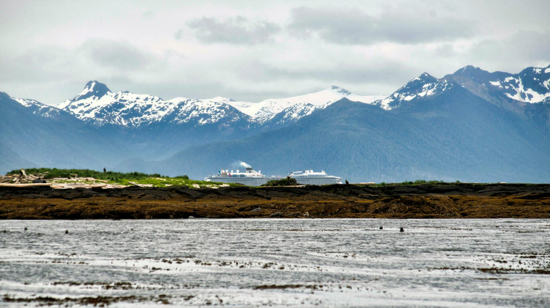 The cruise ship Quantum of the Seas passes through Sitka Sound, Thursday, June 1, 2023, as seen from near Low Island, the site of a fatal charter boat accident, Sunday, May 28. (James Poulson/The Daily Sitka Sentinel via AP)
