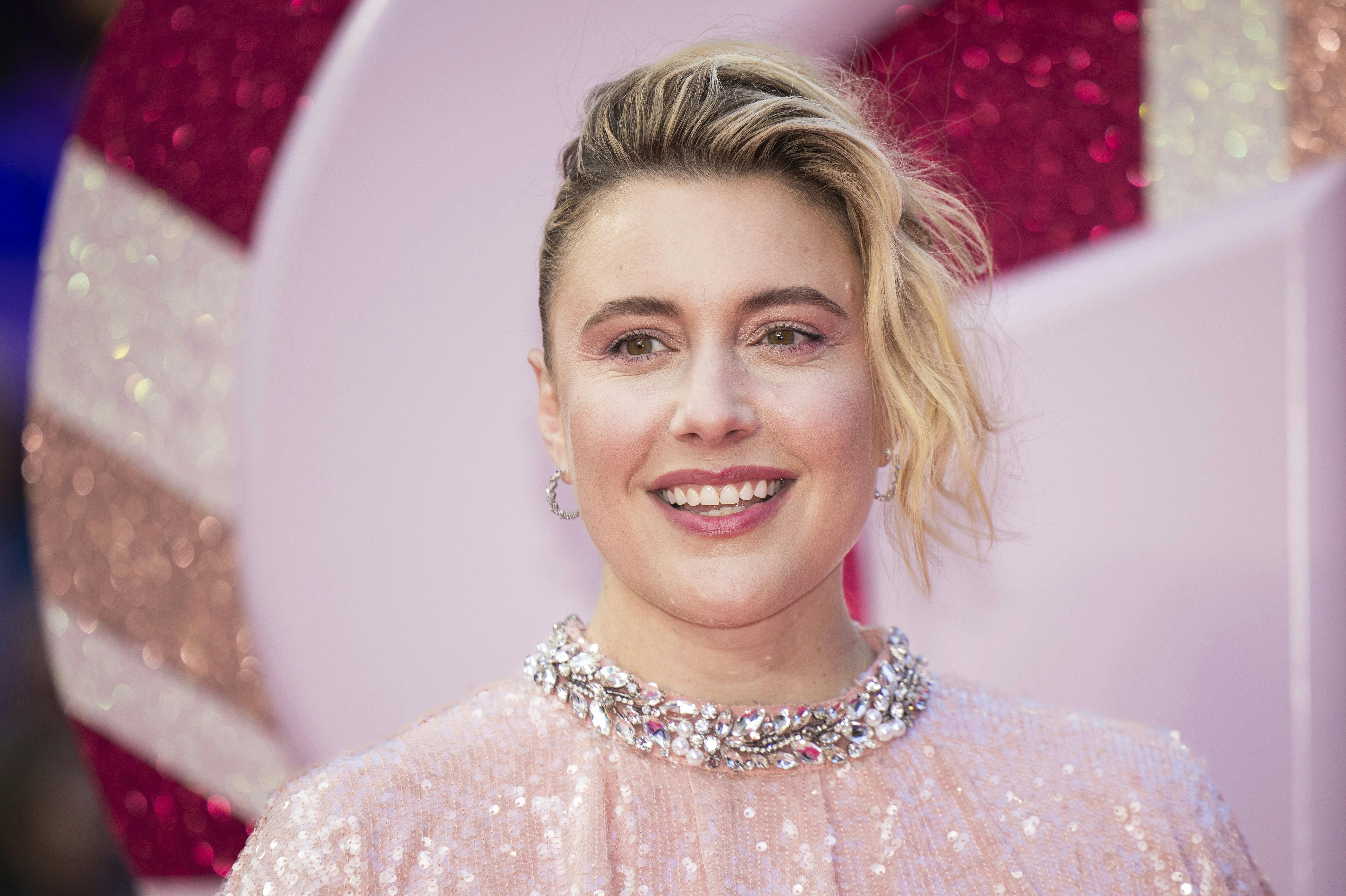 Greta Gerwig poses for photographers upon arrival at the premiere of the film 'Barbie' on Wednesday, July 12, 2023, in London. (Vianney Le Caer/Invision/AP)