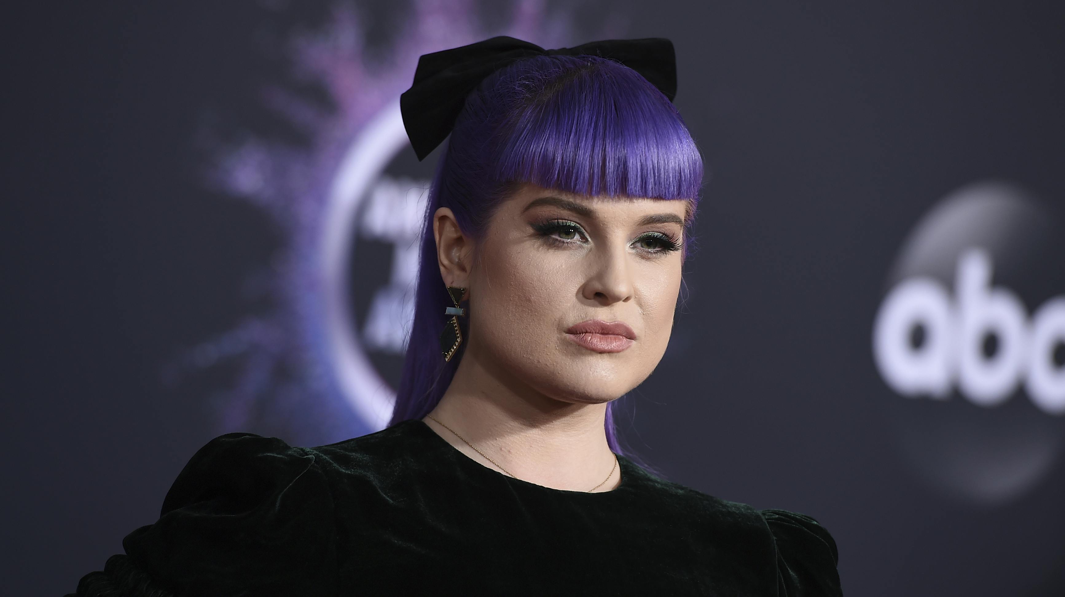 Kelly Osbourne arrives at the American Music Awards on Sunday, Nov. 24, 2019, at the Microsoft Theater in Los Angeles. (Photo by Jordan Strauss/Invision/AP)