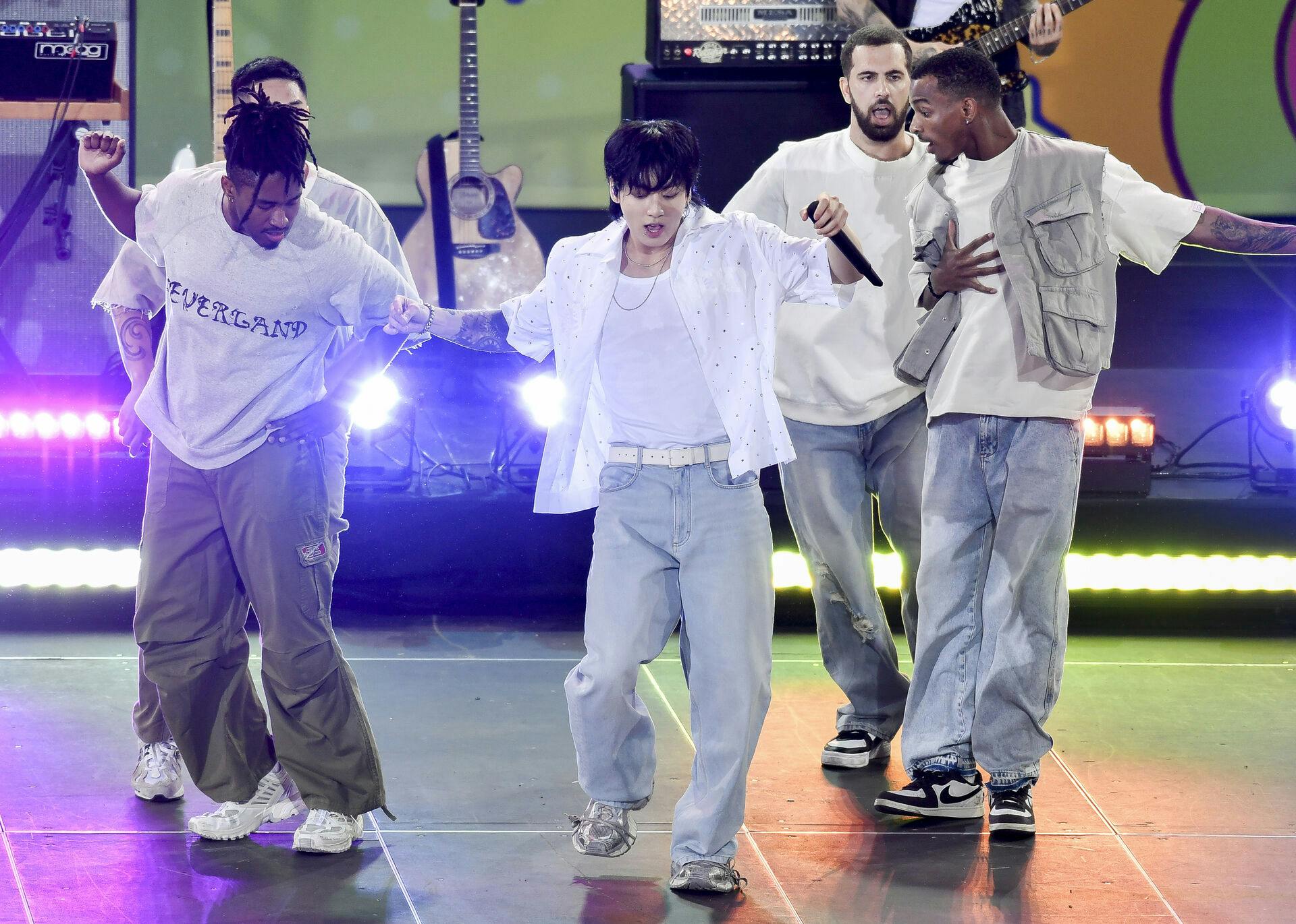 South Korean singer Jung Kook, center, from the K-pop band BTS performs solo on ABC's "Good Morning America" at Rumsey Playfield/SummerStage on Friday, July 14, 2023, in New York. (Photo by Evan Agostini/Invision/AP)