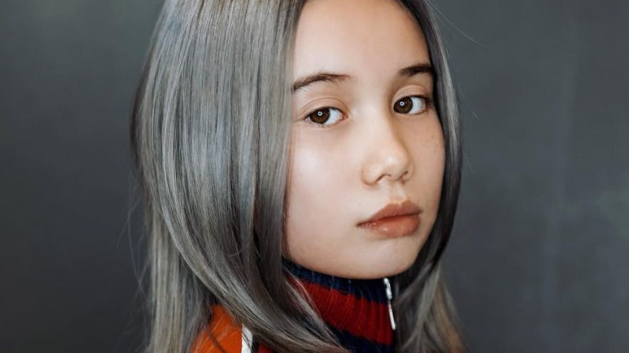 Lil Tay lever.