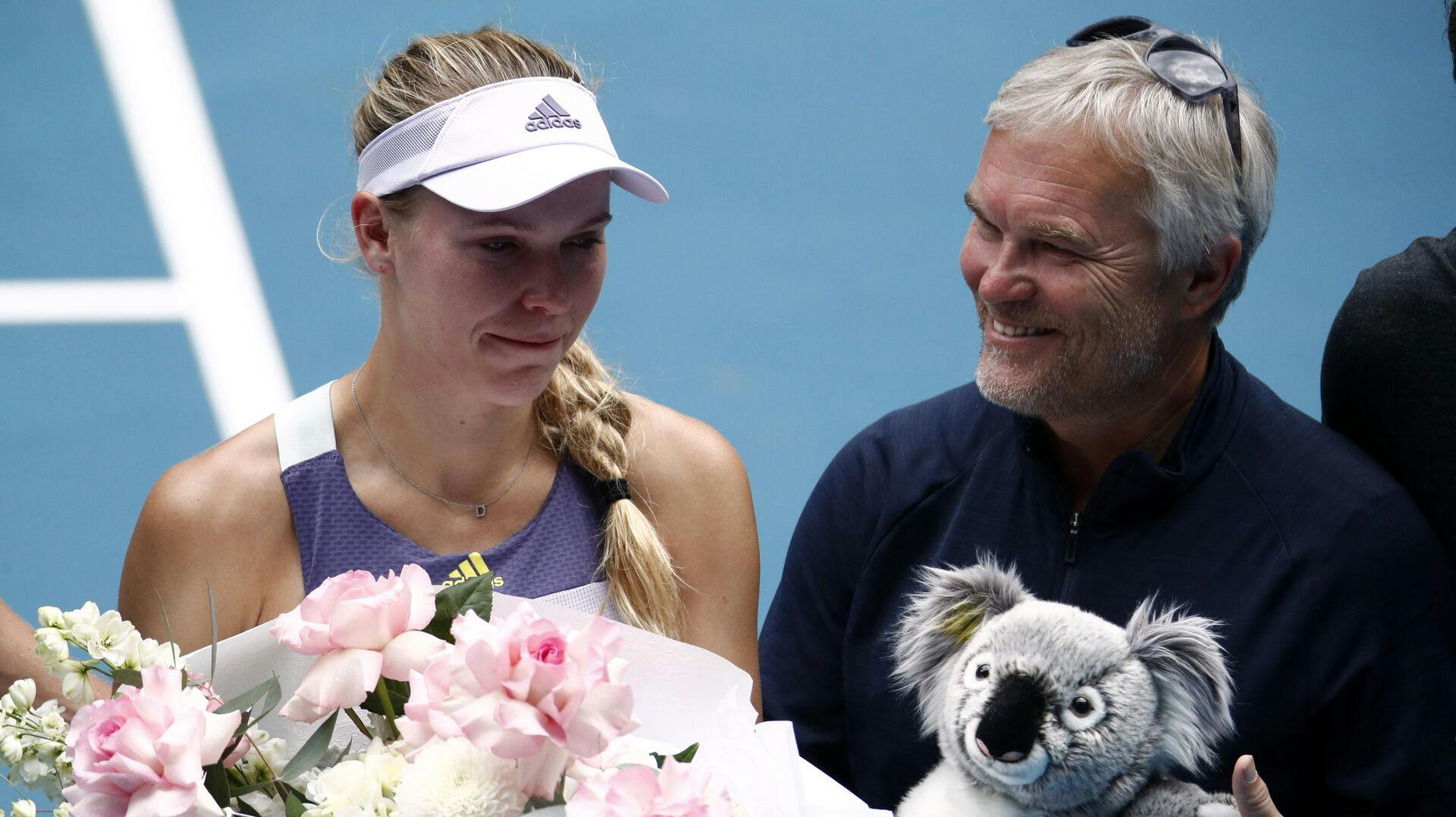 Caroline Wozniacki og farmand Piotr Wozniacki er igen forenet som spiller og træner. 