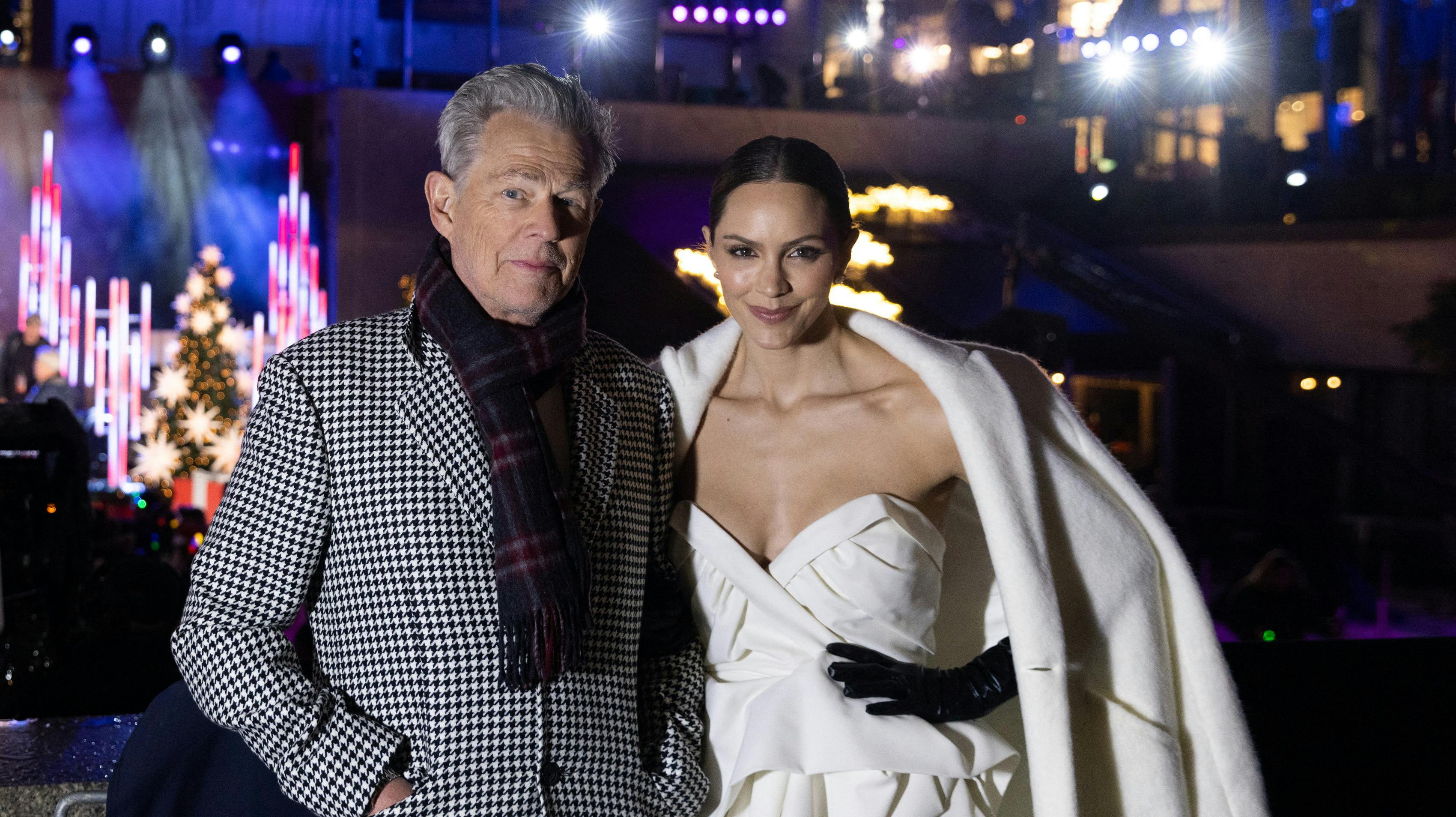 David Foster and Katharine McPhee pose to members of media during lighting of The Rockefeller Center Christmas Tree in New York City, U.S., November 30, 2022. REUTERS/Jeenah Moon
