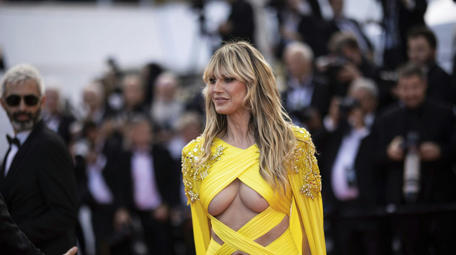 Heidi Klum poses for photographers upon arrival at the premiere of the film 'The Pot-au-Feu' at the 76th international film festival, Cannes, southern France, Wednesday, May 24, 2023. (Photo by Vianney Le Caer/Invision/AP)
