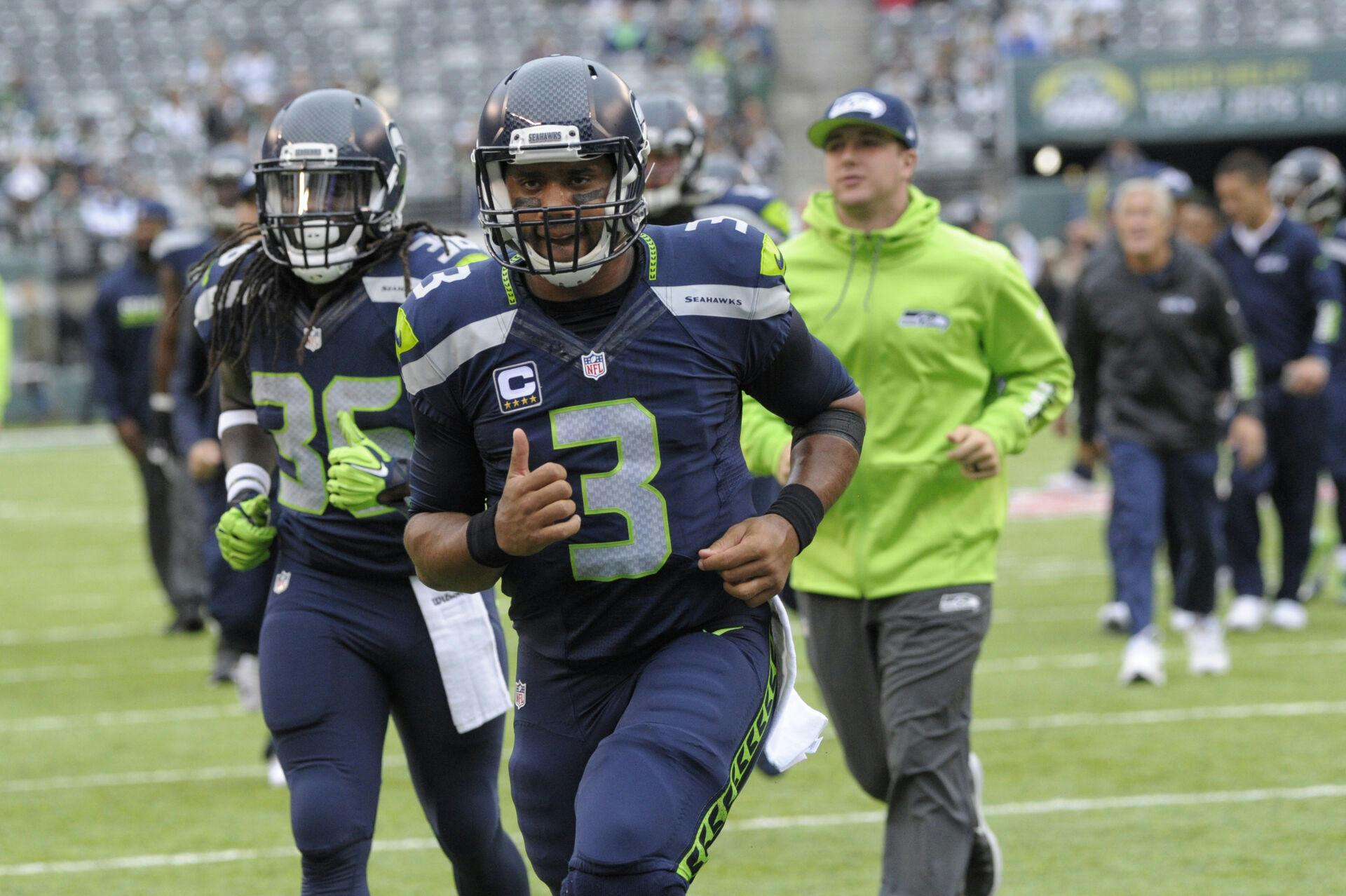 De tidligere kollegaer og gode venner ses her i aktion for Seattle Seahawks i 2016. Russell Wilson spiller i dag quaterback for Denver Broncos.