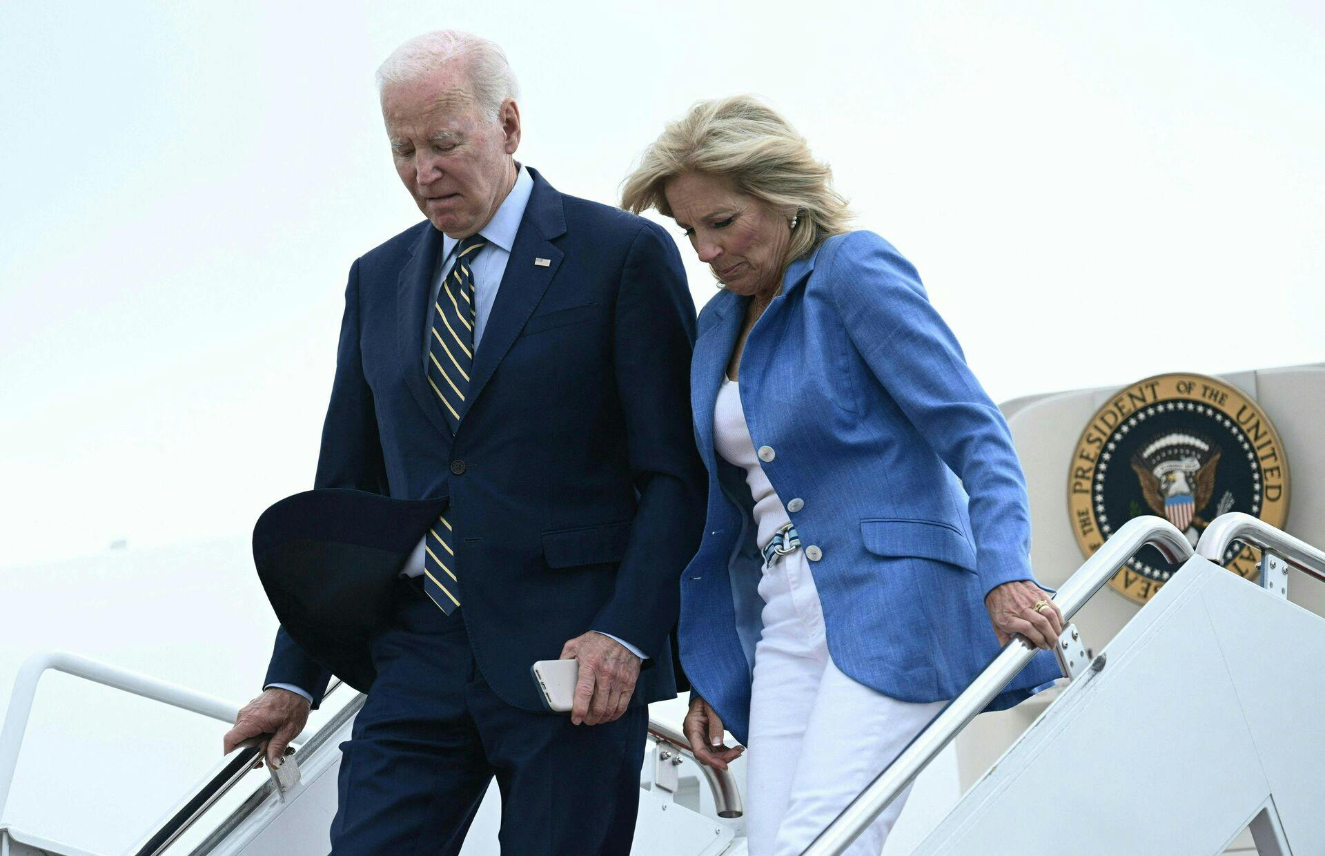 US President Joe Biden and First Lady Jill Biden arrive at Joint Base Andrews in Maryland on August 7, 2023. (Photo by Brendan SMIALOWSKI / AFP)