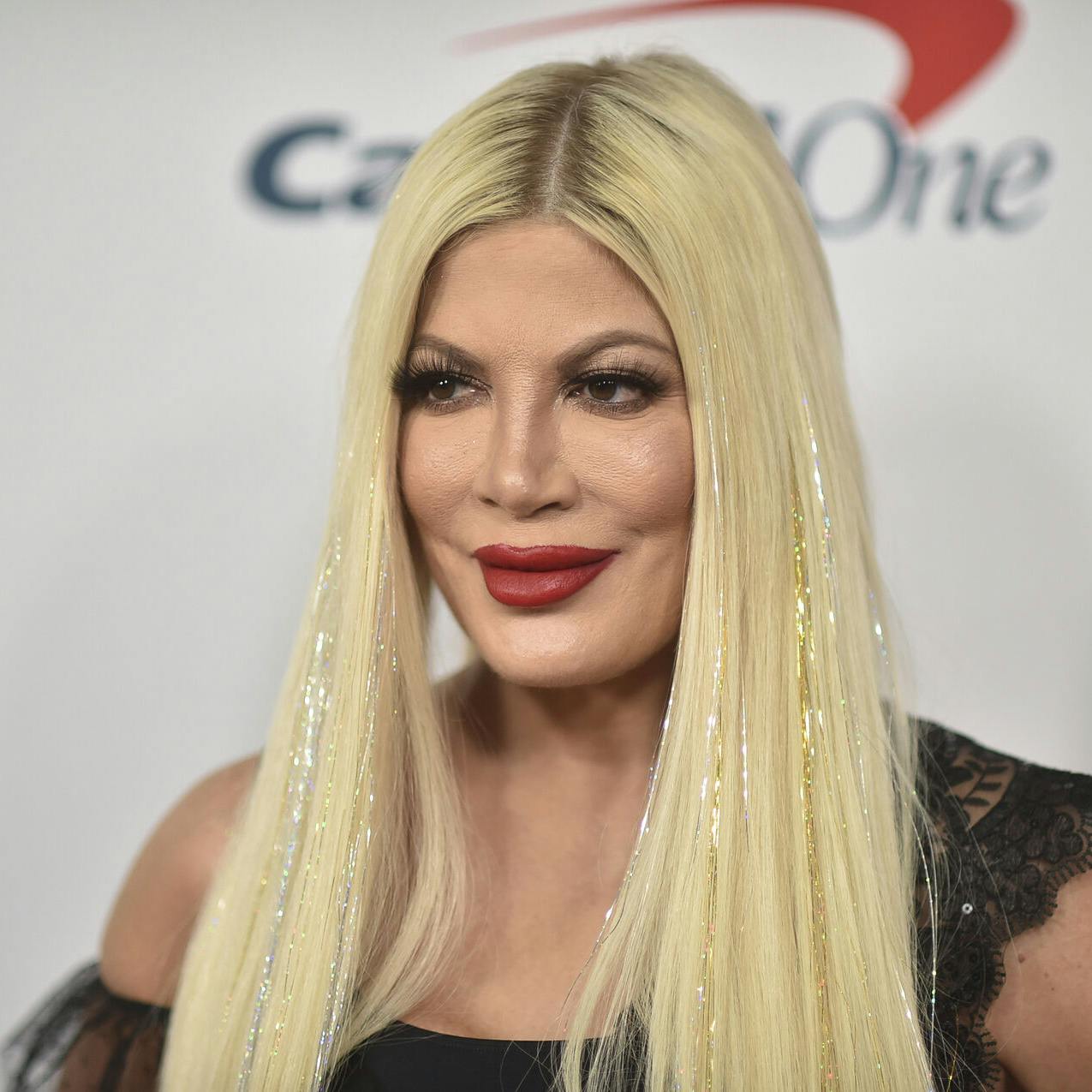 Tori Spelling arrives at the 2021 Jingle Ball Los Angeles at the Forum on Friday, Dec. 3, 2021, in Inglewood, Calif. (Photo by Richard Shotwell/Invision/AP)