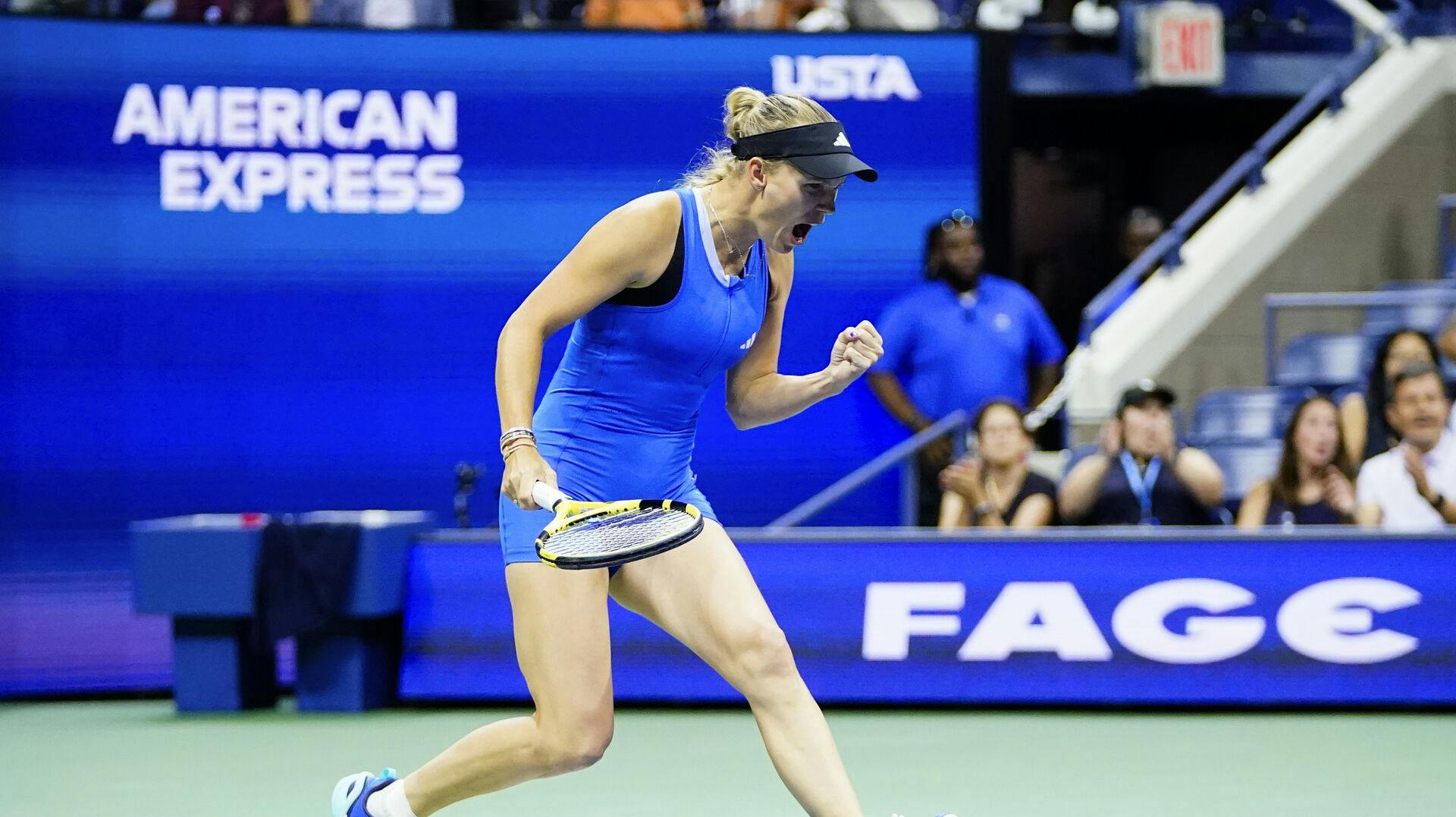 Caroline Wozniacki, of Denmark, reacts during a match against Petra Kvitova, of the Czech Republic, at the second round of the U.S. Open tennis championships, Wednesday, Aug. 30, 2023, in New York. (AP Photo/Frank Franklin II)