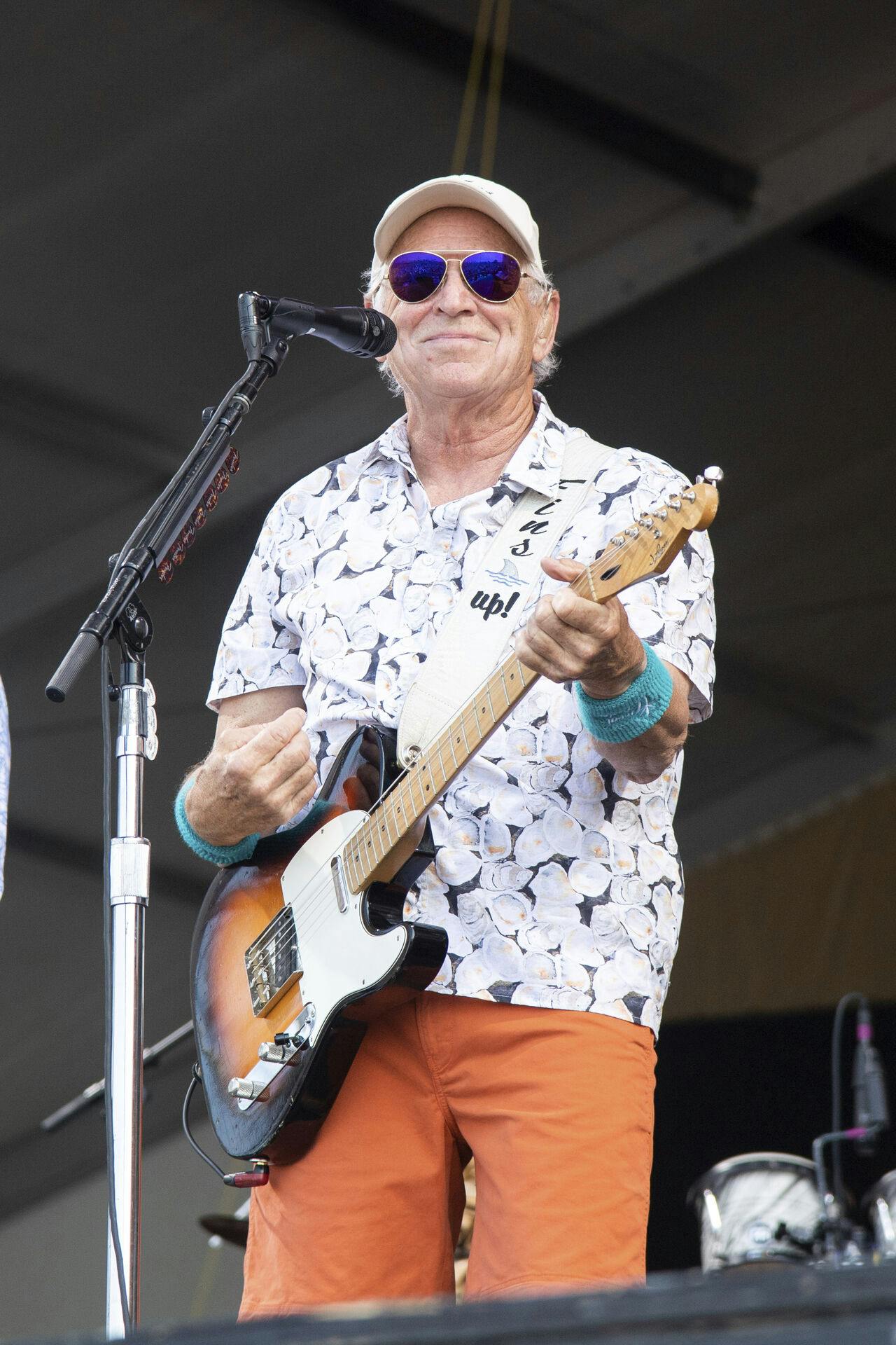 Jimmy Buffett performs at the New Orleans Jazz and Heritage Festival, on Sunday, May 8, 2022, in New Orleans. (Photo by Amy Harris/Invision/AP)